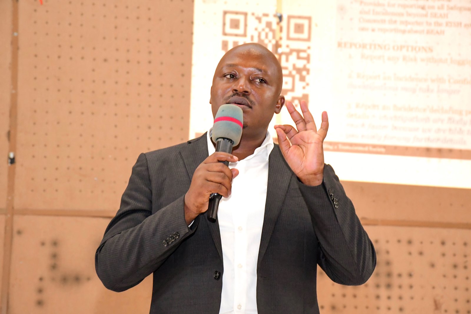 Dr. Rodney Rugyema, representing the Dean of Students. Powerful campaign themed “Safeguarding Starts With Me”, Organized by the Office of the Dean of Students in partnership with the Mastercard Foundation Scholars Program and the College of Business and Management Sciences (CoBAMS), 13th October 2025, Yusuf Lule Central Teaching Facility Auditorium, Makerere University, Kampala Uganda, East Africa.