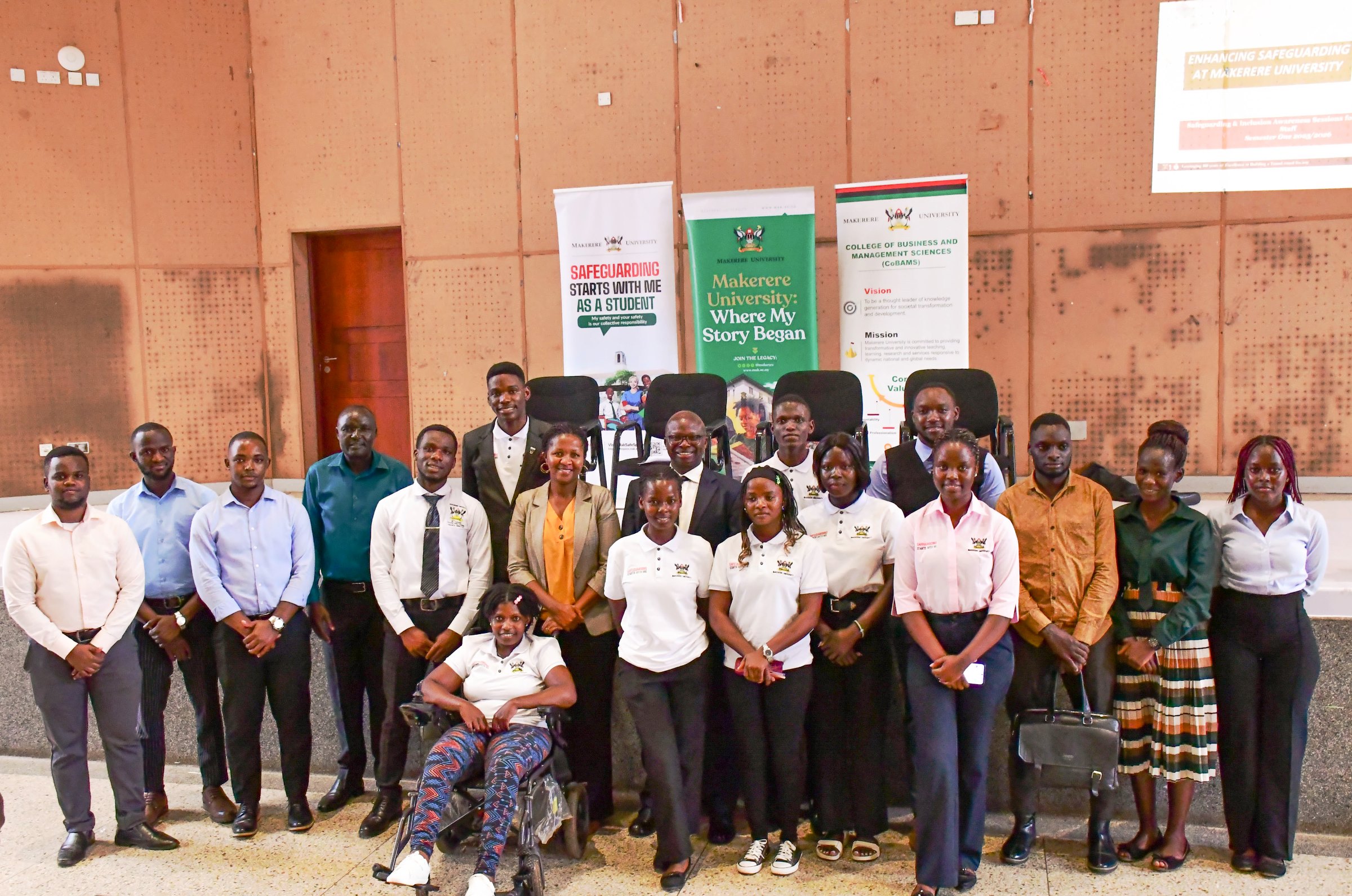 The Deputy Principal, Student Leaders and Safeguarding Champions pose for a photo after the Safeguarding workshop. Powerful campaign themed “Safeguarding Starts With Me”, Organized by the Office of the Dean of Students in partnership with the Mastercard Foundation Scholars Program and the College of Business and Management Sciences (CoBAMS), 13th October 2025, Yusuf Lule Central Teaching Facility Auditorium, Makerere University, Kampala Uganda, East Africa.