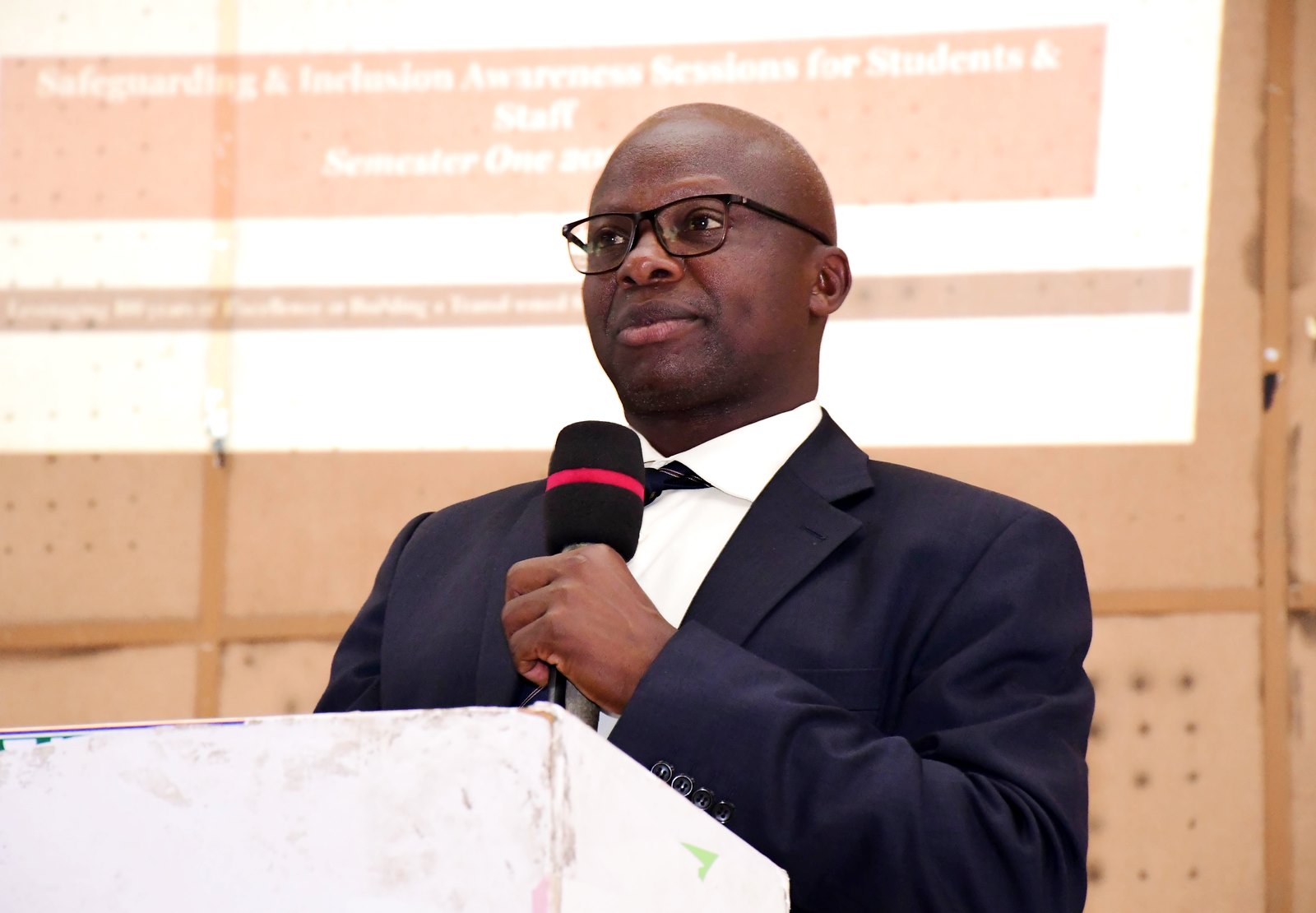 The Deputy Principal of CoBAMS, Assoc. Professor James Wokadala, giving his opening remarks. Powerful campaign themed “Safeguarding Starts With Me”, Organized by the Office of the Dean of Students in partnership with the Mastercard Foundation Scholars Program and the College of Business and Management Sciences (CoBAMS), 13th October 2025, Yusuf Lule Central Teaching Facility Auditorium, Makerere University, Kampala Uganda, East Africa.