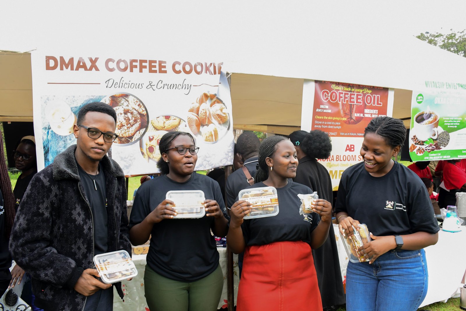 Students exhibiting oil and cookies made out of coffee at the 9th Annual Innovation and Youth Expo in the Freedom Square on 17th October 2025. 9th Annual Innovation and Youth Expo organized by the Makerere University Entrepreneurship and Outreach Centre, College of Business and Management Sciences (CoBAMS), Under the theme, Brewing Prosperity: Youth Entrepreneurship in Uganda’s Coffee Value Chain, 600 student entrepreneurs exhibited more than 300 innovations, 16th-17th October 2025, Yusuf Lule Central Teaching Facility Auditorium and Freedom Square, Kampala Uganda, East Africa.