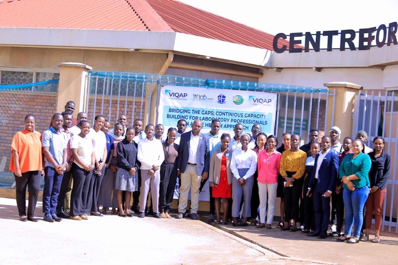 Participants and the facilitators pose for a Group photo with the National Cordinator of the Biosafety and Biosecurity programs of Ministry of Health Mr Joseph Nkodyo (Middle). Centre for Biosecurity and Global Health (CeBIGH) and the Department of Biosecurity, Ecosystems and Veterinary Public Health (BEP) in collaboration with VIQAP Consultancy Services, the Uganda Medical Laboratory Technologists Association (UMLTA), the Biosafety and Biosecurity Association of Uganda (BBAU), and the Uganda National Health Laboratories and Diagnostic Services, conducted a three-day Biorisk Management (Biosafety and Biosecurity) training, 20th to 22nd October 2025 at COVAB, Makerere University, Kampala Uganda, East Africa.