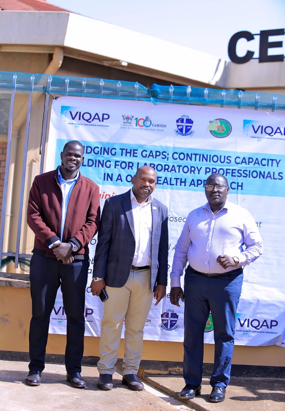 Some of the participants pose for a Photo with Mr Joseph Nkodyo (In the Middle)- The National Coordinator of Biosafety and Biosecurity programs from Ministry of Health. Centre for Biosecurity and Global Health (CeBIGH) and the Department of Biosecurity, Ecosystems and Veterinary Public Health (BEP) in collaboration with VIQAP Consultancy Services, the Uganda Medical Laboratory Technologists Association (UMLTA), the Biosafety and Biosecurity Association of Uganda (BBAU), and the Uganda National Health Laboratories and Diagnostic Services, conducted a three-day Biorisk Management (Biosafety and Biosecurity) training, 20th to 22nd October 2025 at COVAB, Makerere University, Kampala Uganda, East Africa.