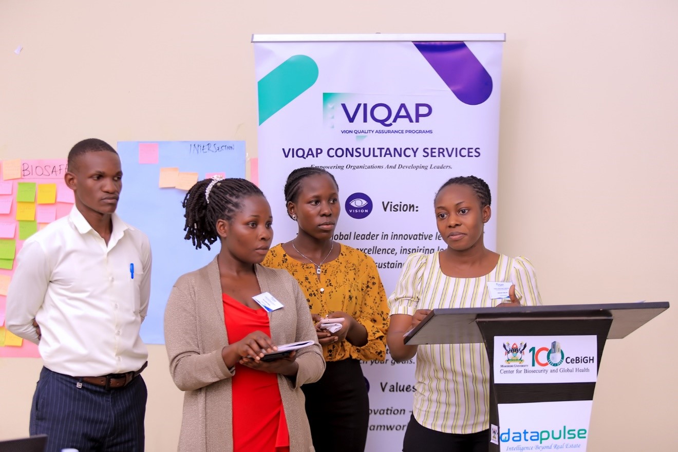 Some of the participant in an engaging group presentation. Centre for Biosecurity and Global Health (CeBIGH) and the Department of Biosecurity, Ecosystems and Veterinary Public Health (BEP) in collaboration with VIQAP Consultancy Services, the Uganda Medical Laboratory Technologists Association (UMLTA), the Biosafety and Biosecurity Association of Uganda (BBAU), and the Uganda National Health Laboratories and Diagnostic Services, conducted a three-day Biorisk Management (Biosafety and Biosecurity) training, 20th to 22nd October 2025 at COVAB, Makerere University, Kampala Uganda, East Africa.