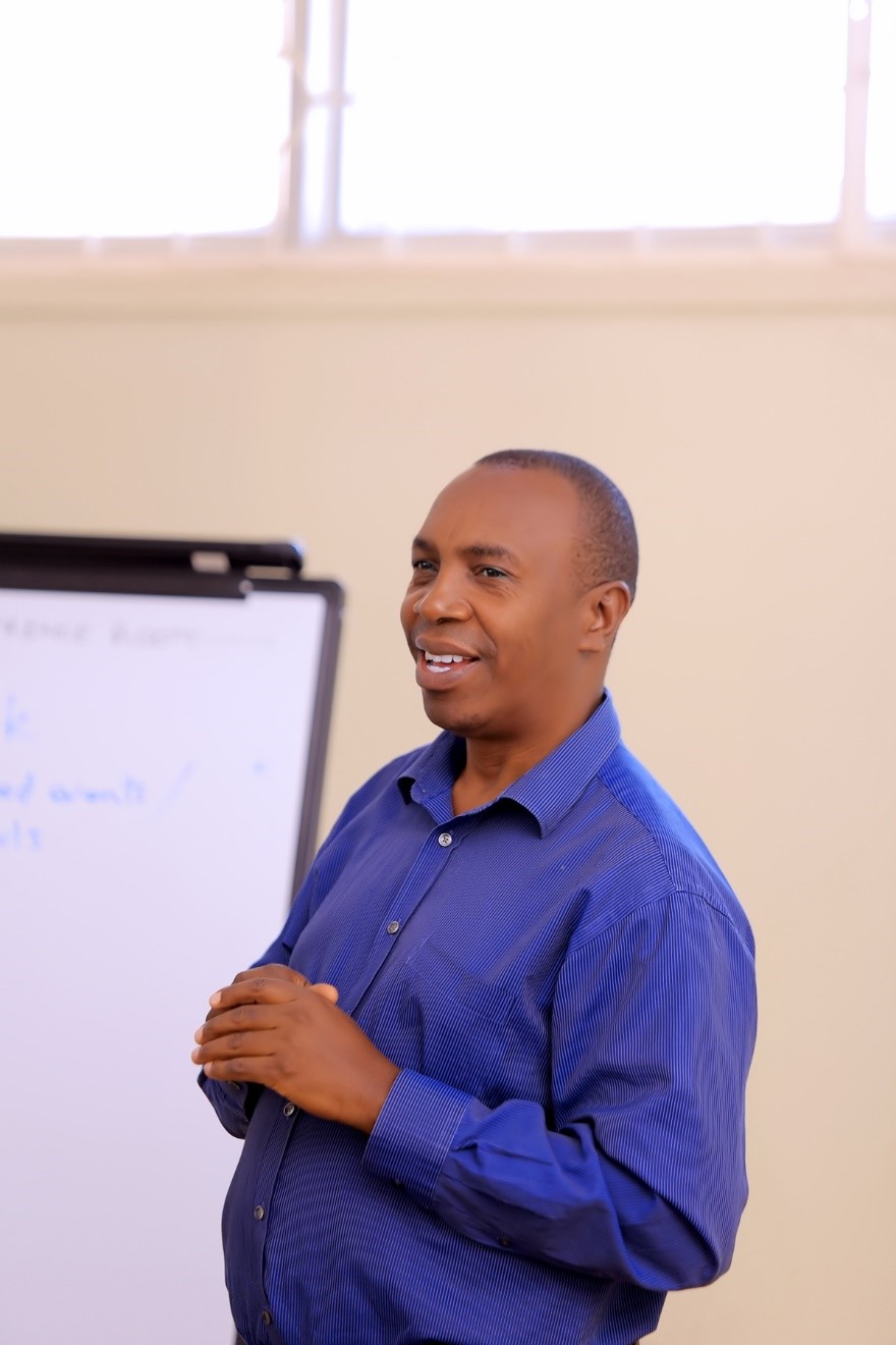 Prof. Clovice Kankya, the Head of Department of Biosecurity, Ecosystems and Veterinary Public Health, Makerere University addressing the participants. Centre for Biosecurity and Global Health (CeBIGH) and the Department of Biosecurity, Ecosystems and Veterinary Public Health (BEP) in collaboration with VIQAP Consultancy Services, the Uganda Medical Laboratory Technologists Association (UMLTA), the Biosafety and Biosecurity Association of Uganda (BBAU), and the Uganda National Health Laboratories and Diagnostic Services, conducted a three-day Biorisk Management (Biosafety and Biosecurity) training, 20th to 22nd October 2025 at COVAB, Makerere University, Kampala Uganda, East Africa.