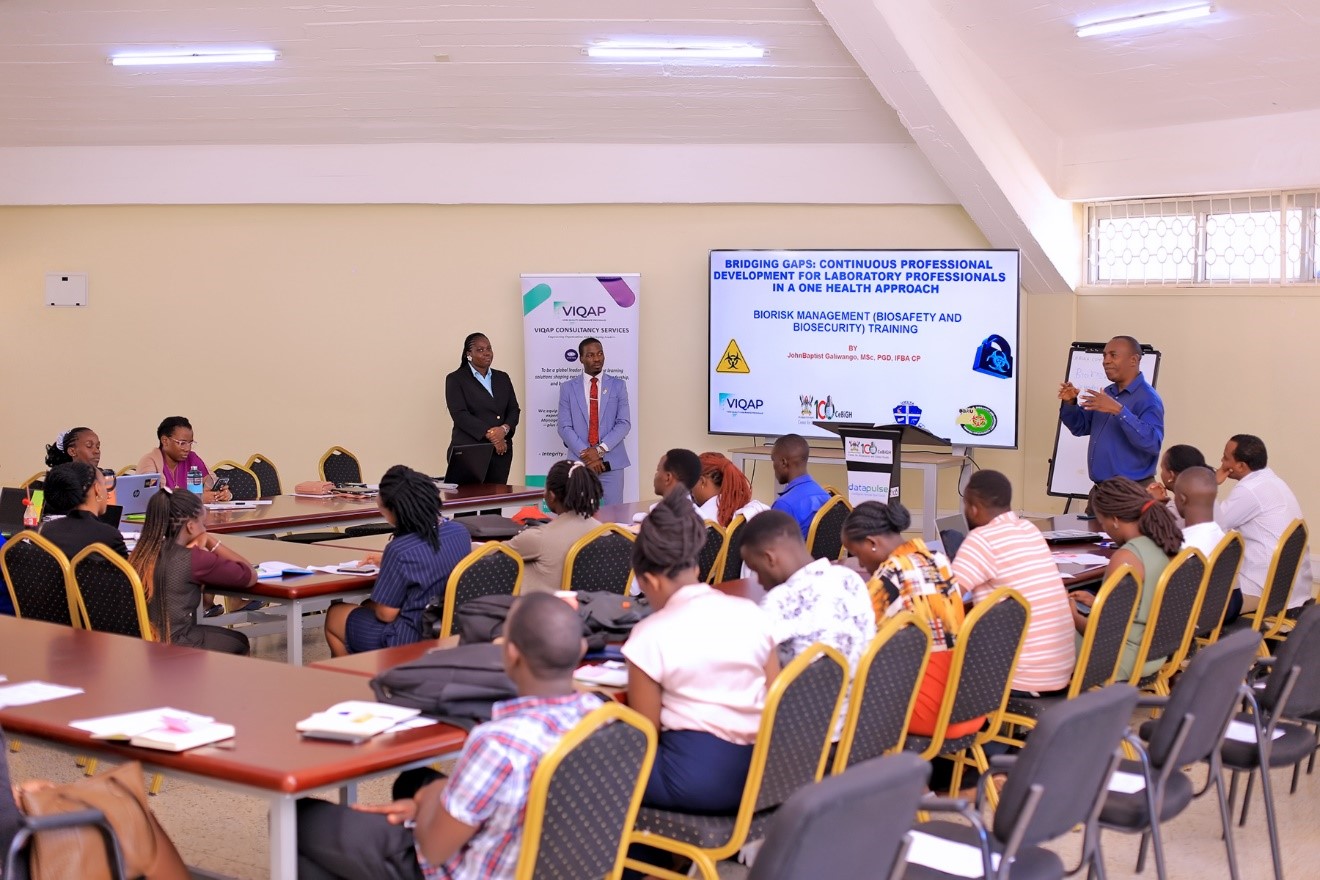 Prof. Clovice Kankya, the Head of Department of Biosecurity, Ecosystems and Veterinary Public Health, Makerere University addressing the participants. Centre for Biosecurity and Global Health (CeBIGH) and the Department of Biosecurity, Ecosystems and Veterinary Public Health (BEP) in collaboration with VIQAP Consultancy Services, the Uganda Medical Laboratory Technologists Association (UMLTA), the Biosafety and Biosecurity Association of Uganda (BBAU), and the Uganda National Health Laboratories and Diagnostic Services, conducted a three-day Biorisk Management (Biosafety and Biosecurity) training, 20th to 22nd October 2025 at COVAB, Makerere University, Kampala Uganda, East Africa.