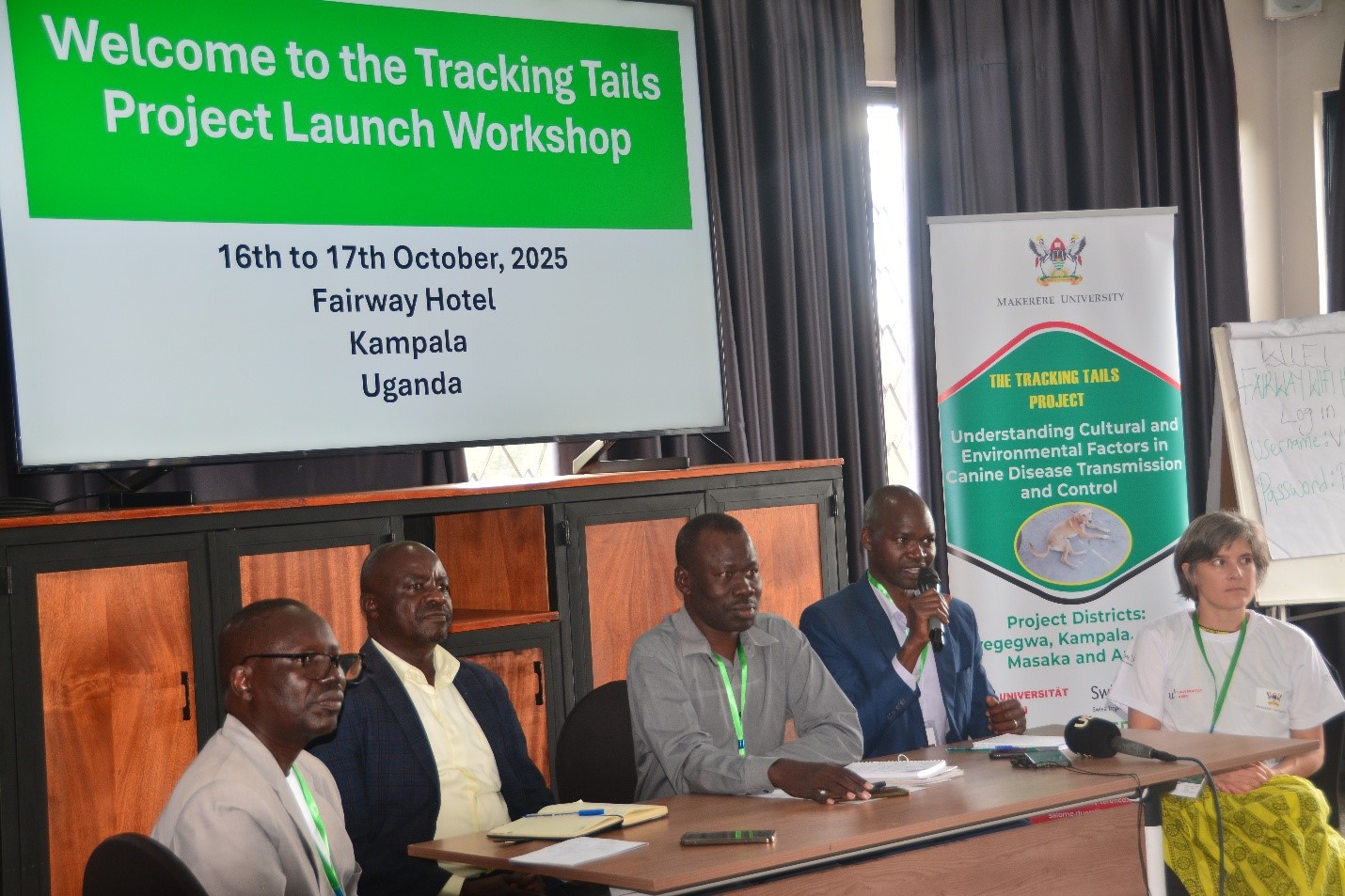 Prof. James Acai Okwee (C) officiates at the launch of the project. Makerere University’s College of Veterinary Medicine, Animal Resources and Biosecurity (CoVAB) inaugurates Tracking Trails project, an ambitious, transnational research initiative that aims to expose the spatiotemporal dynamics of free-roaming dogs and their epidemiological implications, particularly concerning rabies, with expertise from Uganda, Chad, India, Indonesia, and Switzerland, exemplifying an ideal One Health model. 16th October 2025, Fairway Hotel, Kampala Uganda, East Africa.