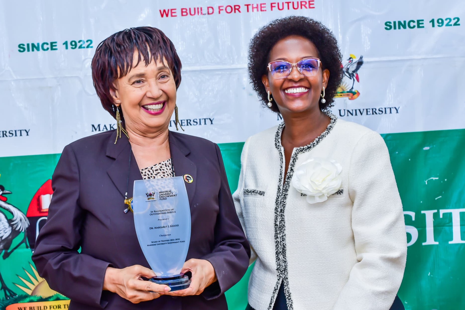 Mrs. Lorna Magara (Right) with Dr. Margaret J. Kigozi and her award for her previous tenure as Chairperson. The 3rd Board of Trustees of the Makerere University Endowment Fund (MakEF) officially inaugurated by Mrs. Lorna Magara, Chairperson of the University Council, 23rd October 2025, Council Room, Kampala Uganda, East Africa.