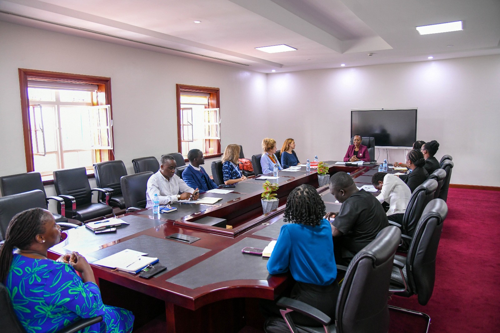 The parties from Makerere University and the University of Groningen meeting in the Vice Chancellor's Boardroom. Strategic meeting between Makerere University and the University of Groningen, Netherlands to move beyond existing collaborations and formalize a new Double Doctorate (PhD) program, 7th October 2025, Main Building, Kampala Uganda, East Africa.