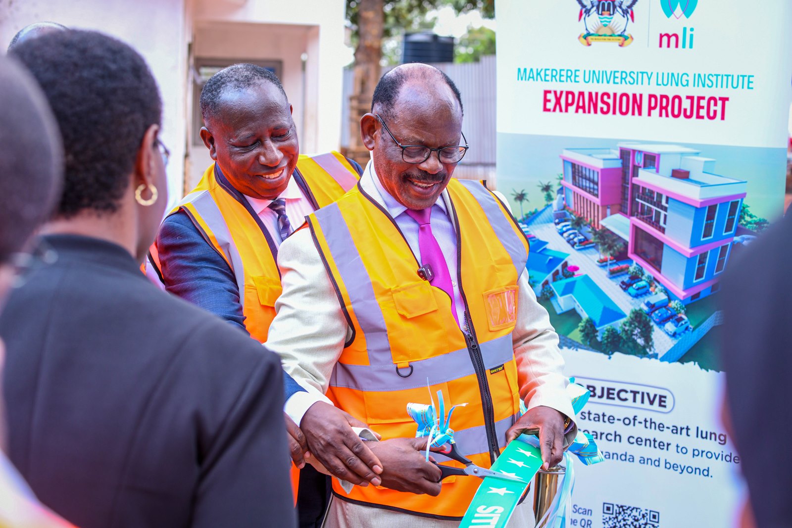 Prof. Barnabas Nawangwe is joined by Prof. Charles Ibingira and other officials to cut the tape, signifying the site handover. Makerere University Lung Institute (MLI) Expansion Project (MEP) site handover to CK Associates on 4th November 2025, Mulago Hill, Kampala Uganda, East Africa.