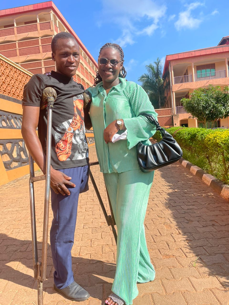 Malvin with Omukaga Samuel, one of the young person's with disabilities she supported to get back into school. Impact Stories: Meet Malvin Akwara, a Mastercard Foundation Scholars Program alumnus, who is dedicated to promoting inclusive education, October 2025, Makerere University, Kampala Uganda, East Africa.