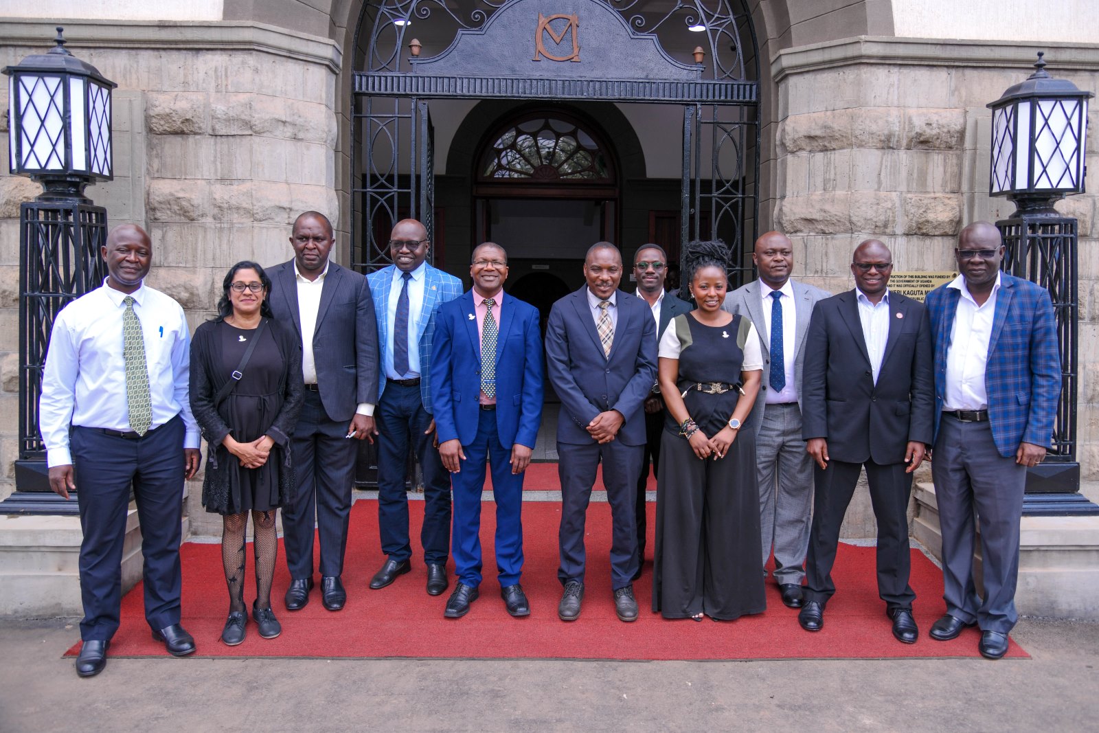 Prof. Winston Tumps Ireeta (6th L) and Prof. Azwinndini Muronga (5th L) with the delegation from NMU and officials from Makerere after the meeting on 7th October 2025. Delegation from Nelson Mandela University (NMU), South Africa meeting with officials from Makerere University on 7th October 2025, Kampala Uganda, East Africa.