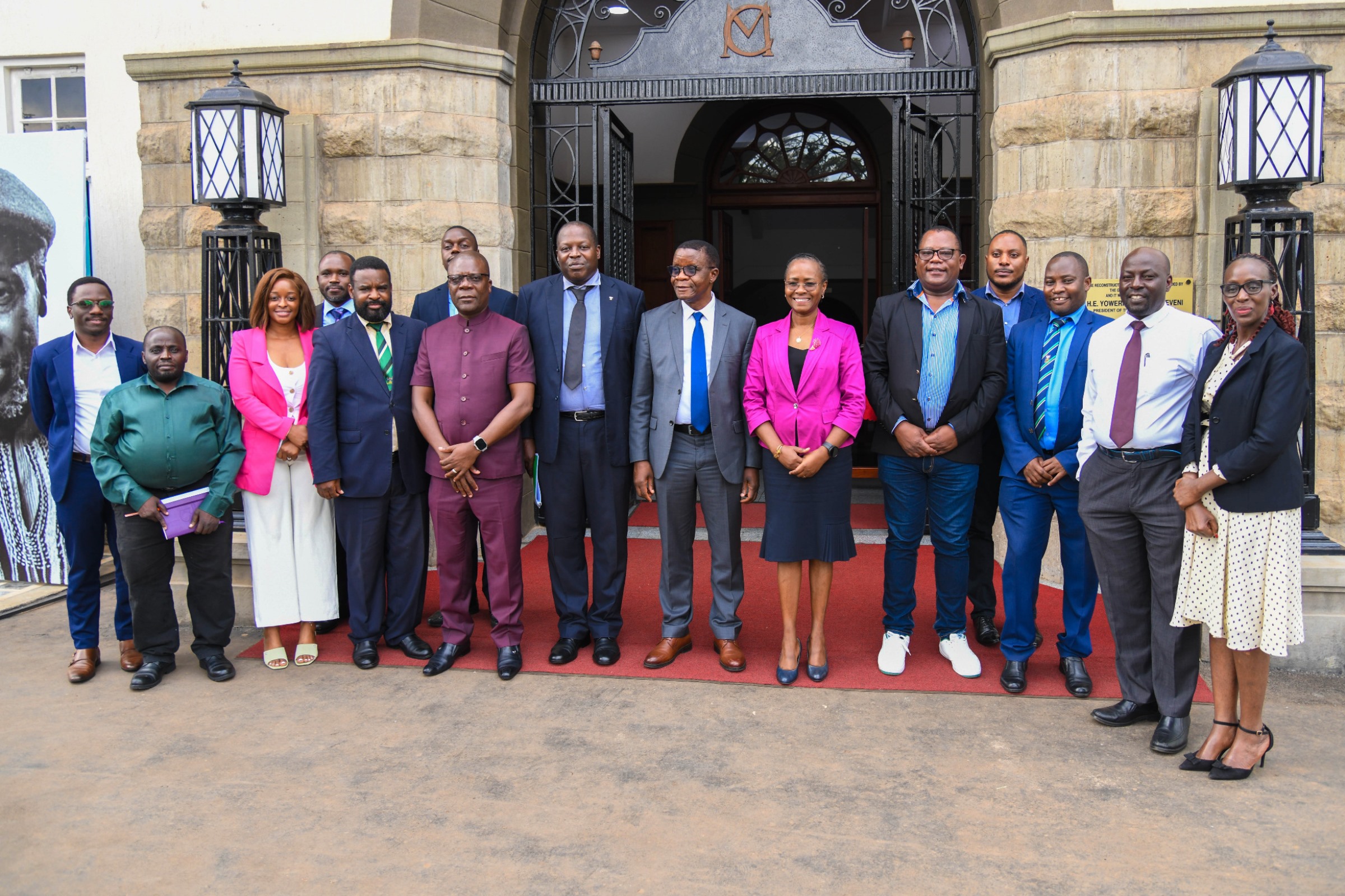 Prof. Sarah Ssali and Prof. Mundia Muya (C) with Members of Management, the ZAMREN delegation and other officials after the courtesy call on 14th October 2025. Zambia Research and Education Network (ZAMREN) Board led by the Chairperson, Prof. Mundia Muya courtesy call on the Vice Chancellor, 14th October 2025, Main Building, Kampala Uganda, East Africa.