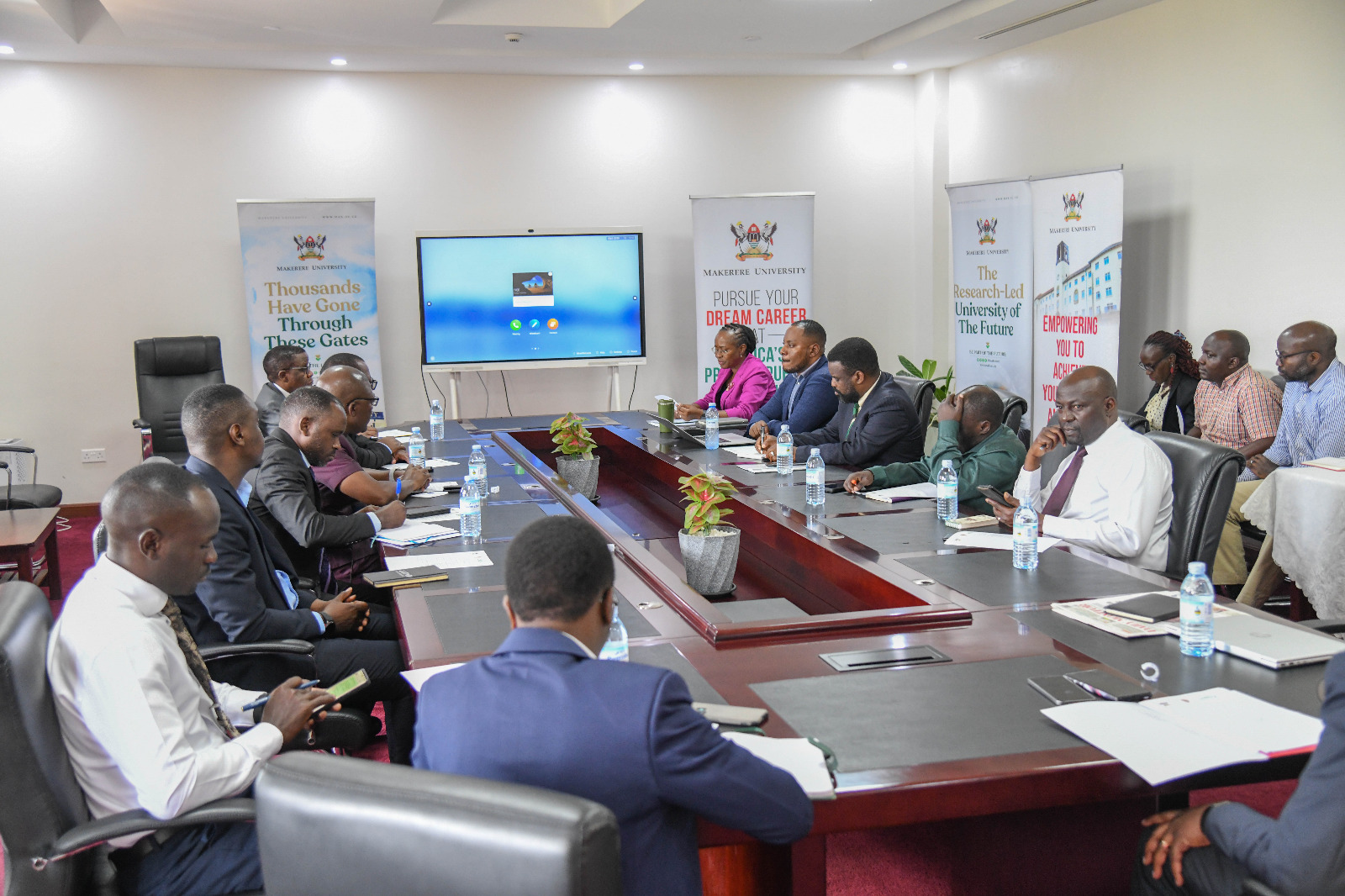 The meeting in session. Zambia Research and Education Network (ZAMREN) Board led by the Chairperson, Prof. Mundia Muya courtesy call on the Vice Chancellor, 14th October 2025, Main Building, Kampala Uganda, East Africa.