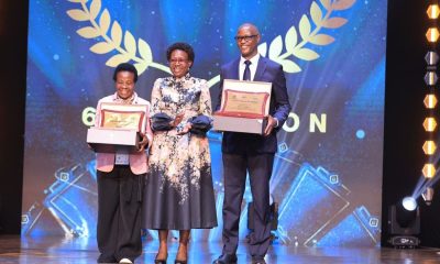 Staff from the Makerere University College of Health Sciences (MakCHS) recognised for their contribution to the health sector in Uganda and beyond during 6th edition of the Heroes in Health Awards (HIHA) held 14th November 2025 during the Africa Health Summit at Kololo Ceremonial Grounds, Kampala Uganda, East Africa. Professor Moses Galukande (Right) and Dr. Mary Nabbosa (Left) with Hon. Dr. Jane Ruth Aceng (Centre) after receiving their respective Minister’s Special Recognition Awards.