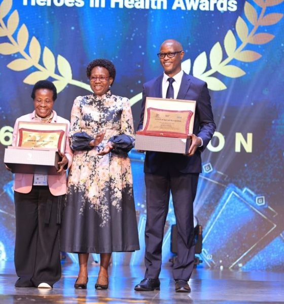 Staff from the Makerere University College of Health Sciences (MakCHS) recognised for their contribution to the health sector in Uganda and beyond during 6th edition of the Heroes in Health Awards (HIHA) held 14th November 2025 during the Africa Health Summit at Kololo Ceremonial Grounds, Kampala Uganda, East Africa. Professor Moses Galukande (Right) and Dr. Mary Nabbosa (Left) with Hon. Dr. Jane Ruth Aceng (Centre) after receiving their respective Minister’s Special Recognition Awards.