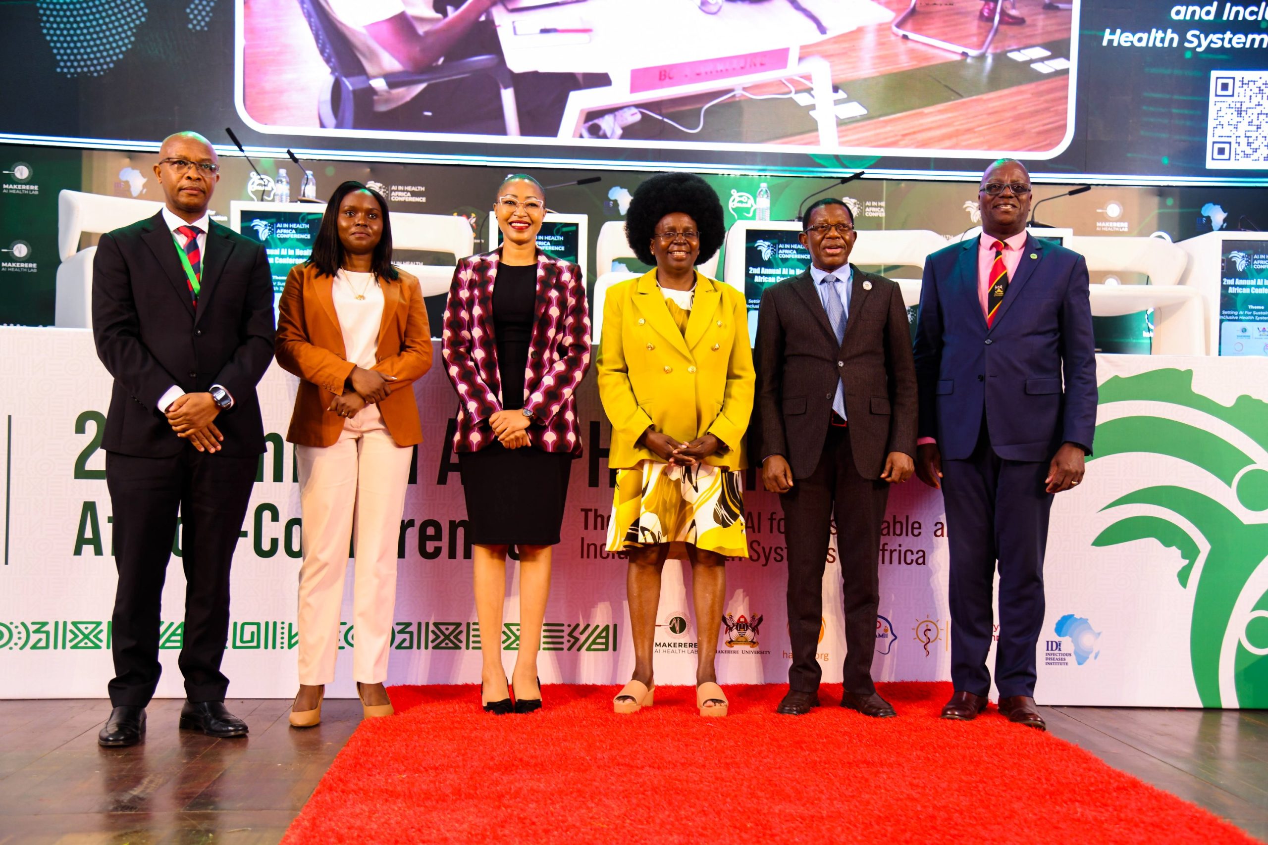 Hon. Dr. Monica Musenero (3rd Right) flanked by Left to Right: Mr. Ambrose Ruyooka, Dr. Rose Nakasi, Dr. Stella Kivila, Prof. Buyinza Mukadasi and Dr. Andrew Kambugu at the Conference Opening Ceremony on 6th November 2025. 2nd Artificial Intelligence (AI) in Health Africa Conference under theme “Setting AI for Sustainable and Inclusive Health Systems in Africa”, Opening Ceremony 6th November 2025, Main Hall, Makerere University, Kampala Uganda, East Africa.
