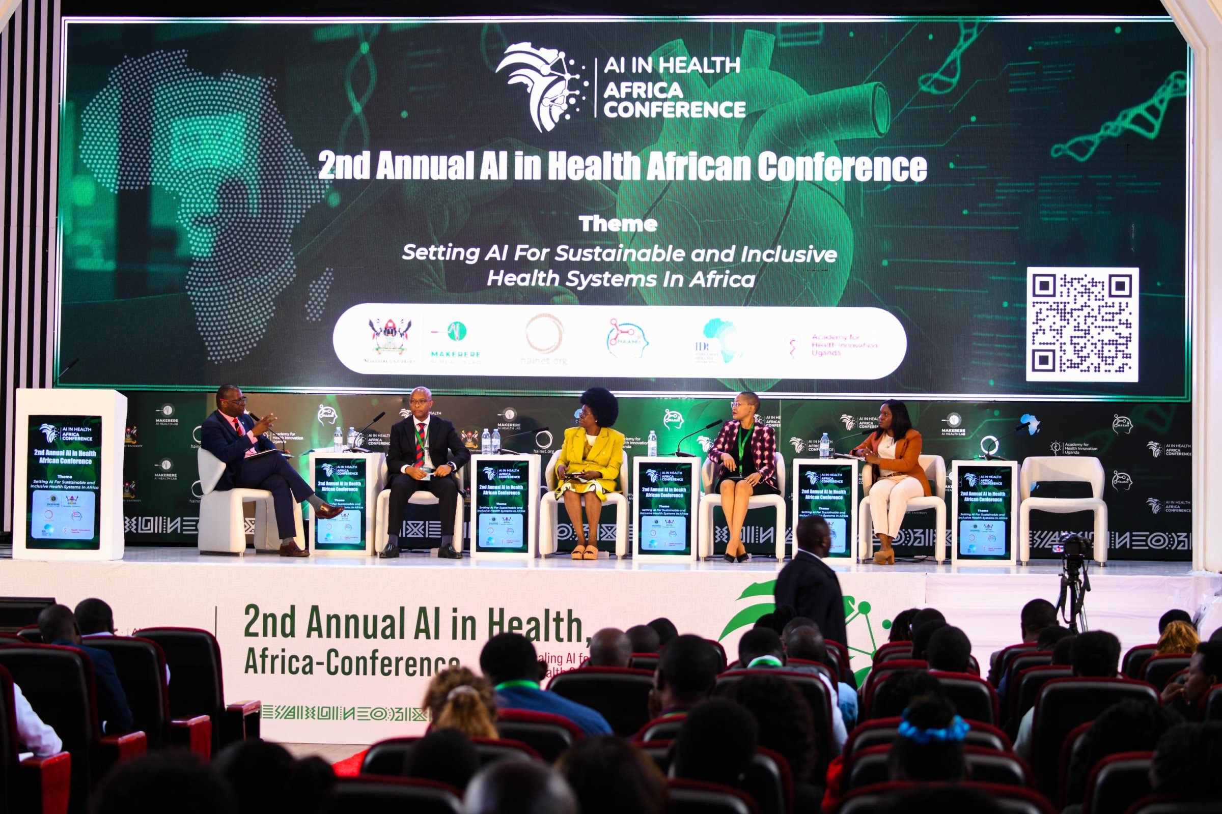 Hon. Dr. Monica Musenero (Centre) flanked by Left to Right: Dr. Andrew Kambugu, Mr. Ambrose Ruyooka, Dr. Stella Kivila and Dr. Rose Nakasi takes part in the plenary session on "The Future of AI in Africa’s Healthcare" on 6th November 2025. 2nd Artificial Intelligence (AI) in Health Africa Conference under theme “Setting AI for Sustainable and Inclusive Health Systems in Africa”, Opening Ceremony 6th November 2025, Main Hall, Makerere University, Kampala Uganda, East Africa.