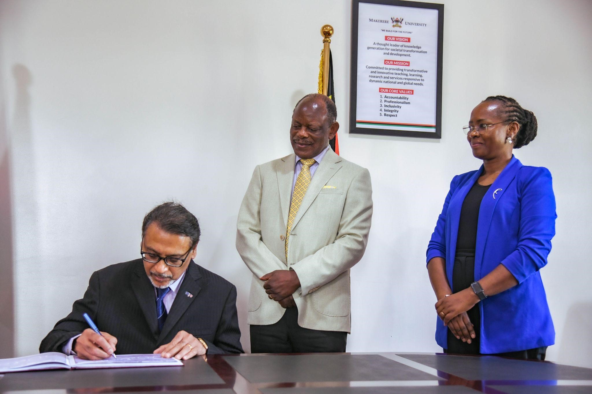 Tan Sri Dato Professor Joseph Adaikalam signs the Vice Chancellor’s Visitor’s book. Makerere University has started preliminary discussions with Binary University of Management and Entrepreneurship (Malaysia) to deepen its global partnerships through high-level engagements, aimed at fostering innovation-driven education, entrepreneurship, and women’s leadership, Main Building, 21st November 2025, Kampala Uganda, East Africa.