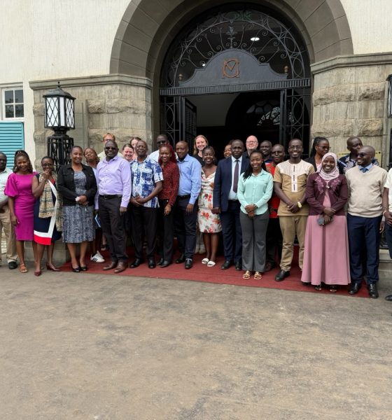 A group photo showing participants of the review meeting for the MERIT project in front of the Main Building. College of Agricultural and Environmental Sciences (CAES) comprehensive impact review of the Environmental Risk Management Under Increasing extremes and Uncertainty (MERIT) Project, bringing together faculty, researchers, students, and partners from Ugandan and Norwegian institutions, 17th November 2025, Main Building, Makerere University, Kampala Uganda, East Africa.