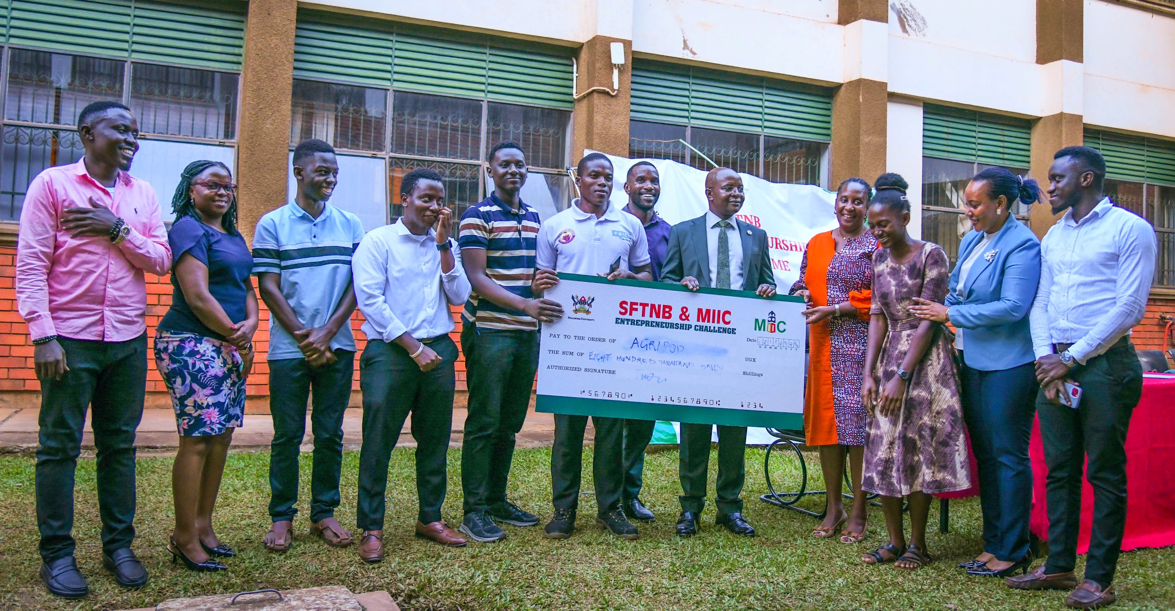 Prof. Bbaale and officials present the Best Overall award to Team Agri Farm. School of Food Technology, Nutrition and Bio-Engineering (SFTNB), in partnership with the Makerere Innovation and Incubation Center (MIIC), third edition of Entrepreneurship Exhibition on 12th November 2025, College of Agricultural and Environmental Sciences (CAES), Makerere University, Kampala Uganda, East Africa.