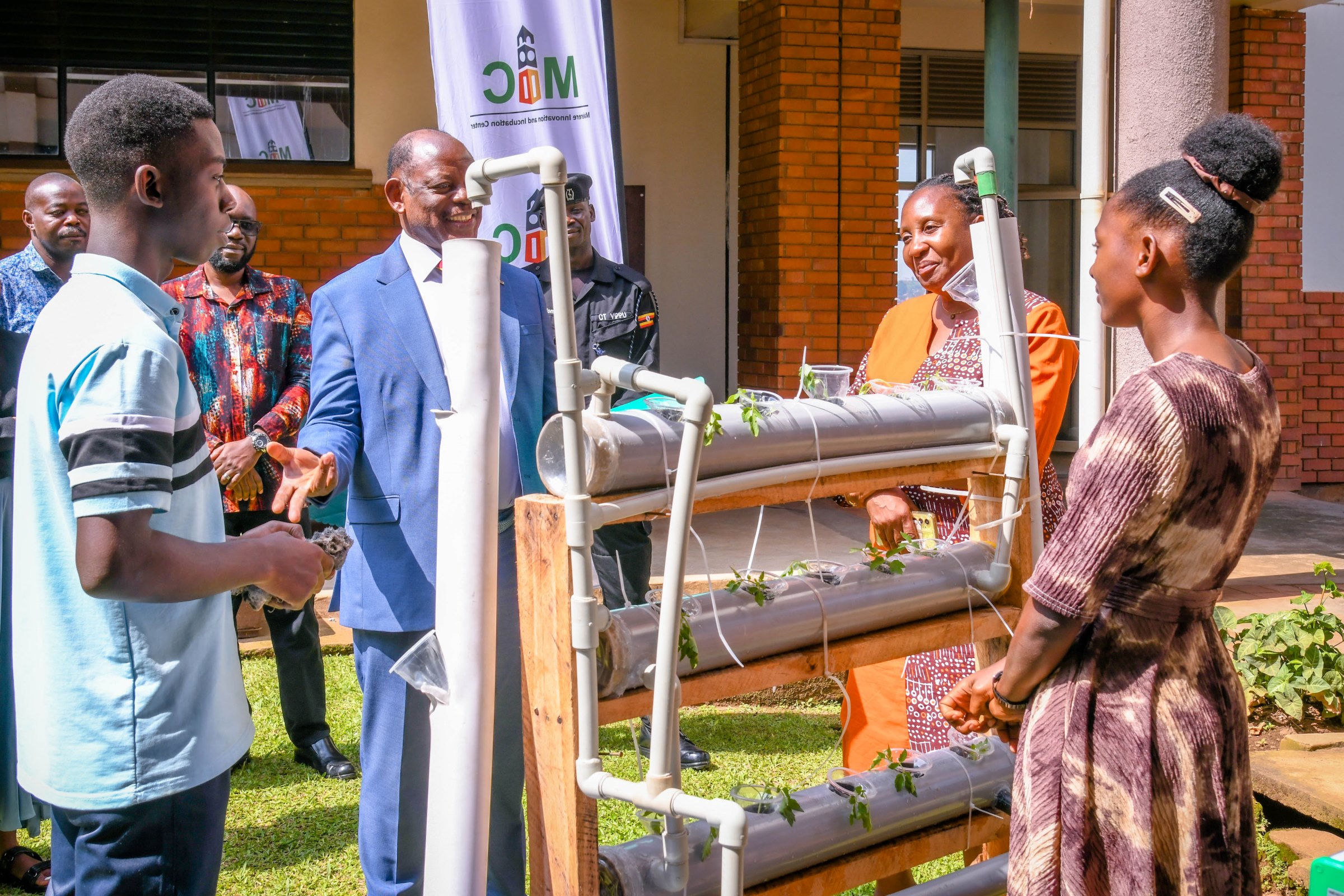 Dr. Julia Kigozi (2nd Right) joins the Vice Chancellor on an inspection of the Agri Farm Team's exhibit. School of Food Technology, Nutrition and Bio-Engineering (SFTNB), in partnership with the Makerere Innovation and Incubation Center (MIIC), third edition of Entrepreneurship Exhibition on 12th November 2025, College of Agricultural and Environmental Sciences (CAES), Makerere University, Kampala Uganda, East Africa.