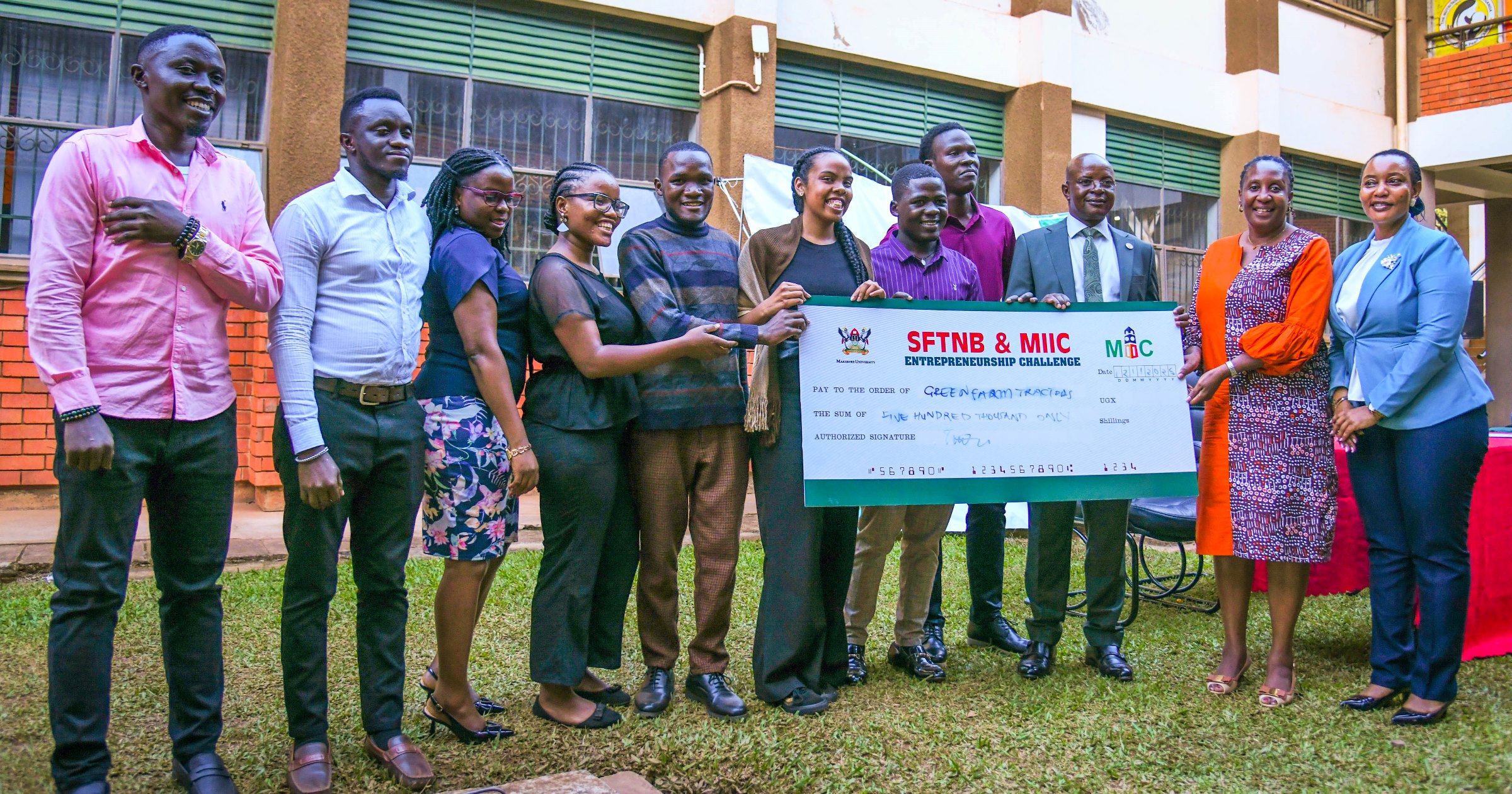 Prof. Bbaale and officials present the First Runner-Up award to Team Green Farm Tractor. School of Food Technology, Nutrition and Bio-Engineering (SFTNB), in partnership with the Makerere Innovation and Incubation Center (MIIC), third edition of Entrepreneurship Exhibition on 12th November 2025, College of Agricultural and Environmental Sciences (CAES), Makerere University, Kampala Uganda, East Africa.