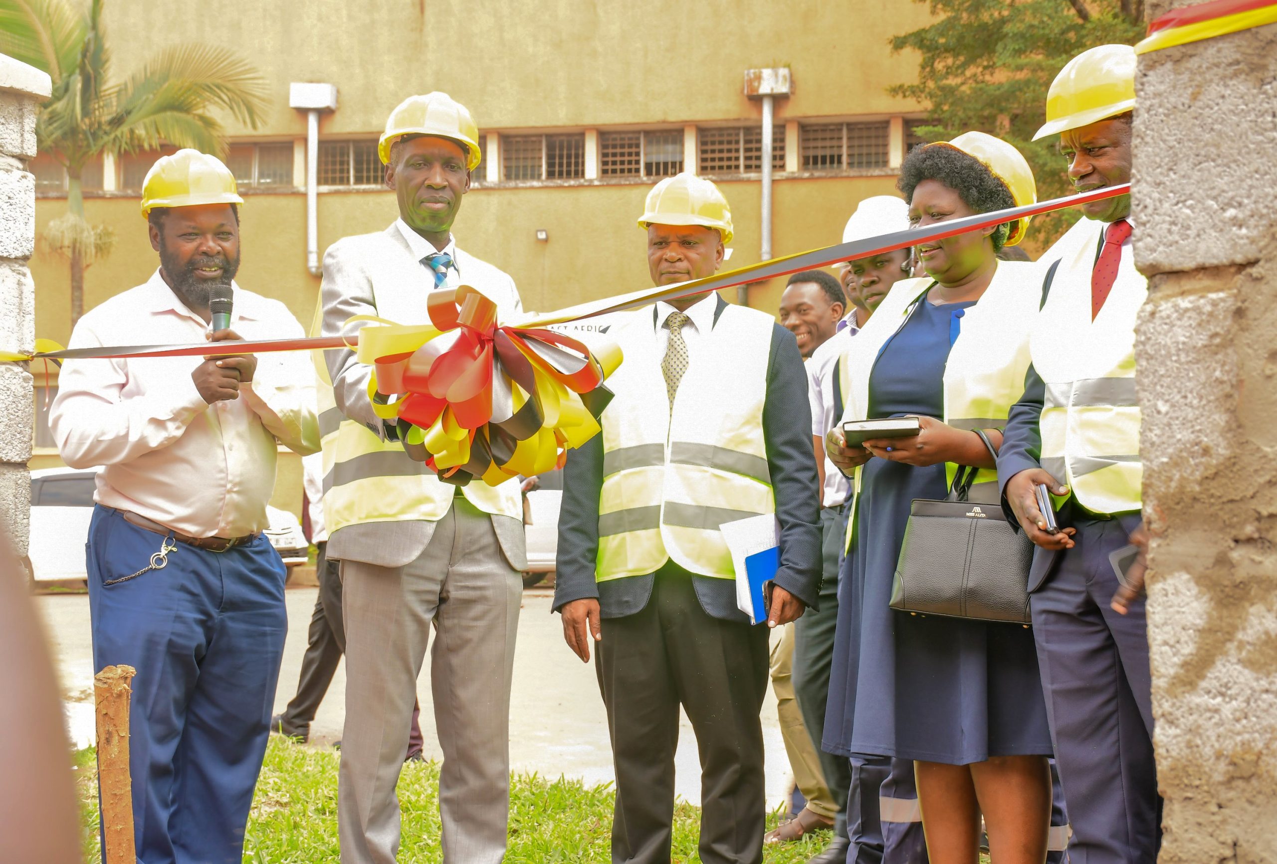 (L-R) Dr. Oscar Mugula, Coordinator of the Center for Lifelong Learning at CEES; Prof. Anthony Mugagga, CEES Principal and representative of the Vice Chancellor, Prof. Barnabas Nawangwe (2nd right); Prof. Moses Musinguzi, Principal of CEDAT; Ms. Jalia Nassaza from UVTAB, and Dr. Martin Muyingo, Head Teacher of Makerere College School, pictured during the official handover of the newly constructed perimeter wall fence on November 12th, 2025. Official hand over of newly constructed wall fence to Makerere College School executed by technical students pursuing higher diploma courses in Civil Engineering and Architecture under the Uganda Vocational and Technical Assessment Board (UVTAB), enrolled at the Centre for Lifelong Learning and Teaching, College of Education and External Studies (CEES), 12th November 2025, Makerere University, Kampala Uganda, East Africa.