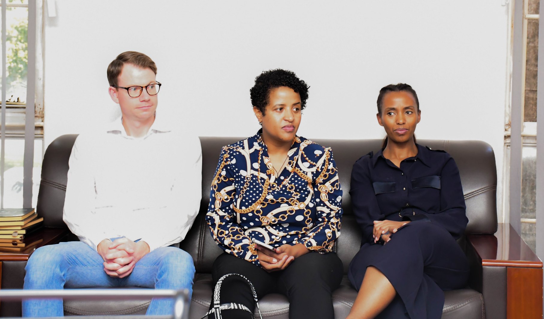 Partnership for Change delegation listening to the proceedings of the inception meeting. College of Education and External Studies, Professor Anthony Muwagga Mugagga, host inception meeting to discuss the modalities of setting up a daycare facility anchored within the Early Childhood Care Education strategy and the Competence Based Education trends, 5th November 2025 Makerere University, Kampala Uganda, East Africa.