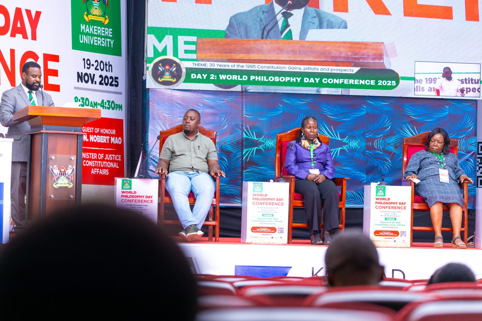 Hon. Loice Biira Bwambale (Right) with other panelists as Prof. Robert Wamala (Left) makes his remarks. World Philosophy Day celebrations 19th–20th November 2025, organized by the Department of Philosophy, College of Humanities and Social Sciences (CHUSS) in collaboration with the School of Law, UNESCO and the Konrad Adenauer Stiftung under the theme: “30 Years of the 1995 Constitution: Gains, Pitfalls and Prospects.” Main Hall, Makerere University, Kampala Uganda, East Africa.