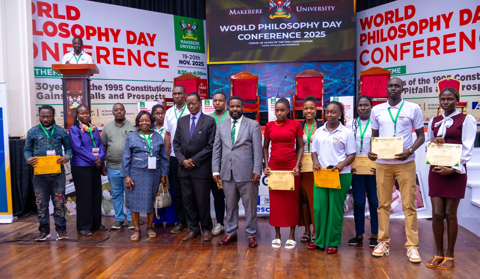 Prof. Robert Wamala with Hon. Ken Lukyamuzi and Hon. Loice Biira Bwambale (To his Left), officials and awardees of certificates. World Philosophy Day celebrations 19th–20th November 2025, organized by the Department of Philosophy, College of Humanities and Social Sciences (CHUSS) in collaboration with the School of Law, UNESCO and the Konrad Adenauer Stiftung under the theme: “30 Years of the 1995 Constitution: Gains, Pitfalls and Prospects.” Main Hall, Makerere University, Kampala Uganda, East Africa.