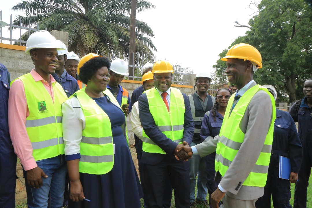 Prof. Muwagga Mugagga and Dr. Muyingo shake hands. Official hand over of newly constructed wall fence to Makerere College School executed by technical students pursuing higher diploma courses in Civil Engineering and Architecture under the Uganda Vocational and Technical Assessment Board (UVTAB), enrolled at the Centre for Lifelong Learning and Teaching, College of Education and External Studies (CEES), 12th November 2025, Makerere University, Kampala Uganda, East Africa.