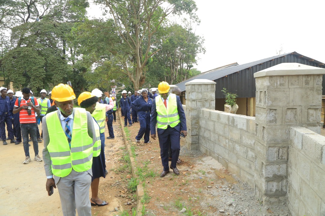 Prof. Anthony Muwagga Mugagga (Left), Dr. Martin Muyingo (Right) and other officials inspect the project. Official hand over of newly constructed wall fence to Makerere College School executed by technical students pursuing higher diploma courses in Civil Engineering and Architecture under the Uganda Vocational and Technical Assessment Board (UVTAB), enrolled at the Centre for Lifelong Learning and Teaching, College of Education and External Studies (CEES), 12th November 2025, Makerere University, Kampala Uganda, East Africa.