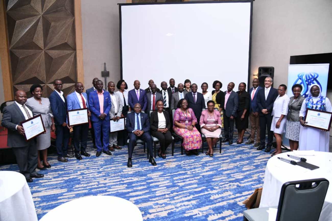 Seated: The Chair-Prof. Grace Bantebya Kyomuhendo (2nd R) with UNAS Vice President-Dr. Mary Goretti Nakabugo (2nd L) and Council Members Prof. David Okello Owiny (L) and Prof. Grace Ndeezi (R). Professor Edward Bbaale, Principal of the College of Business and Management Sciences (CoBAMS), Makerere University, inducted into the prestigious fellowship of the Uganda National Academy of Sciences (UNAS), 31st October 2025, Kampala Uganda, East Africa.