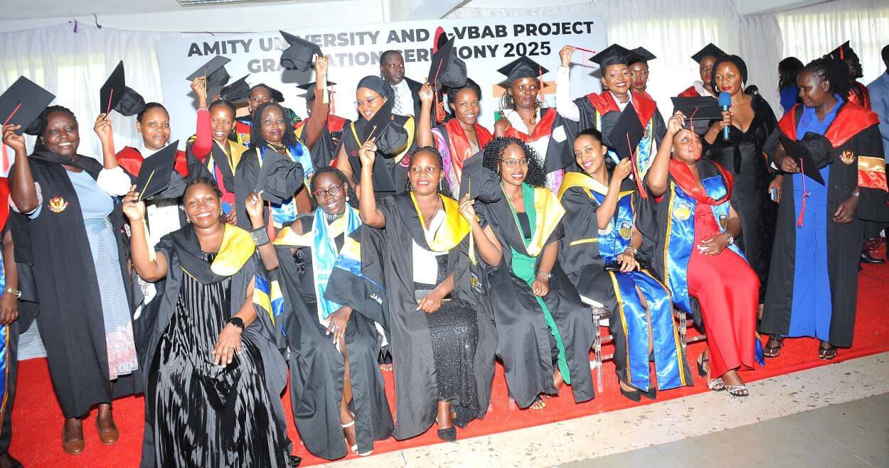A section of the female graduands in a group photo with the Principal. College of Computing and Information Sciences (CoCIS) graduates 71 students under Phase 2 of the e-VBAB Project, a collaboration between Amity University in India and Makerere University, presided over by Principal Prof. Tonny Oyana on behalf of the Vice Chancellor, Block B CoCIS, 21st November 2025, Kampala Uganda, East Africa.
