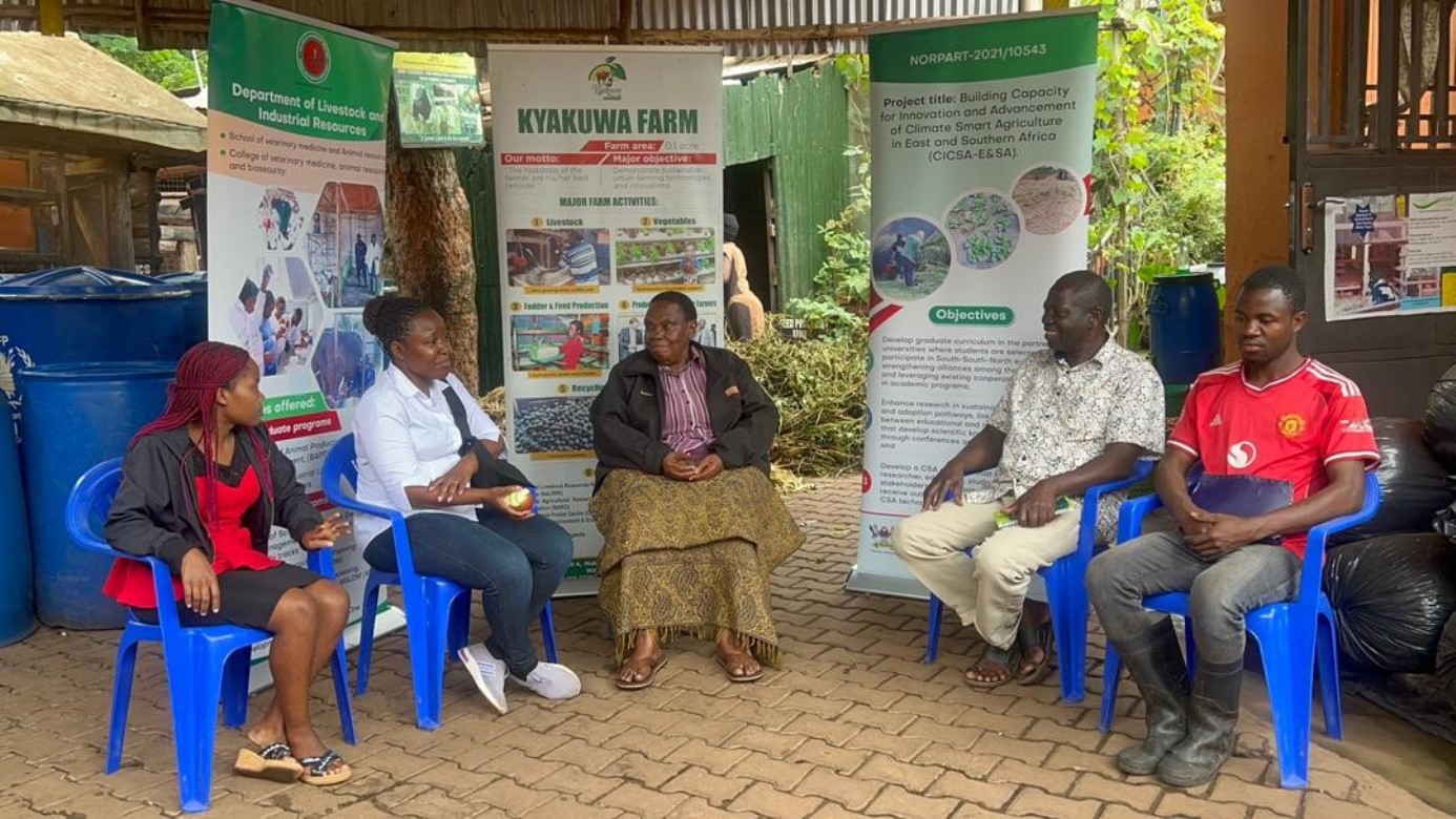 Dr. Dorothy Nampanzira (L), the Principal Investigator, interacts with Prof. Kabirizi at Kyakuwa Dairy farm. Regional research initiative “Building Capacity for Innovation and Advancement of Climate Smart Agriculture in East and Southern Africa” (CICSA-E&SA) visited Prof. Jolly M. L. Kabirizi, Executive Director of Kyakuwa Dairy Farm and animal research scientist at Valley University of Science and Technology, welcomed the Makerere University team to the model site for urban farming innovations in Wakiso District, Uganda, East Africa