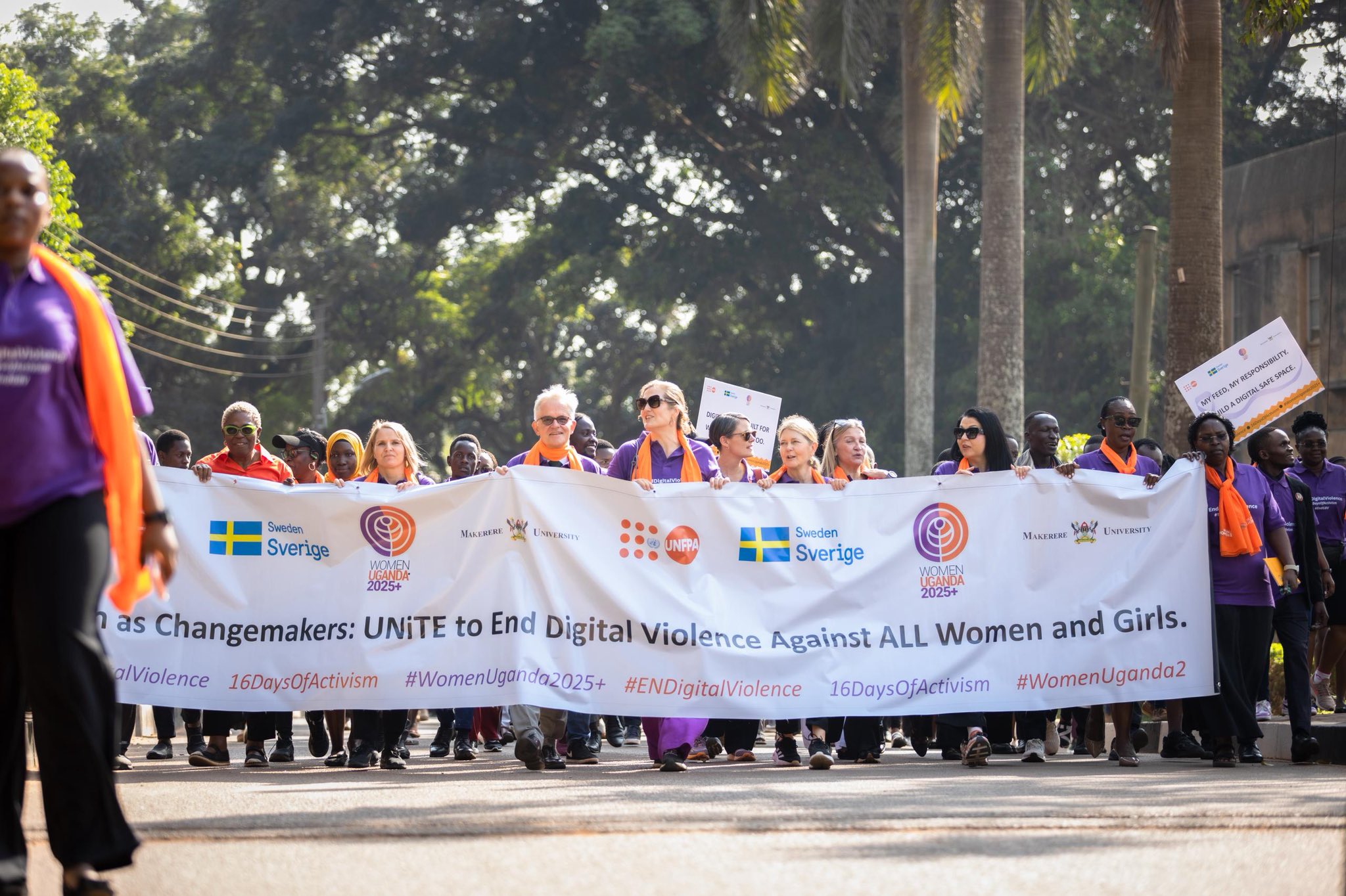 Heads of Diplomatic Missions are joined by Dr. Winifred Kabumbuli and Dr. Euzobia Mugisa Baine (Right) as they march with the banner along Mary Stuart Road. Makerere University in partnership with Embassy of Sweden in Uganda and UNFPA in Uganda hosted the "Strides for Change" Activism walk and official unveiling of the 2025 16 Days of Activism campaign on Monday 24th November, 2025.