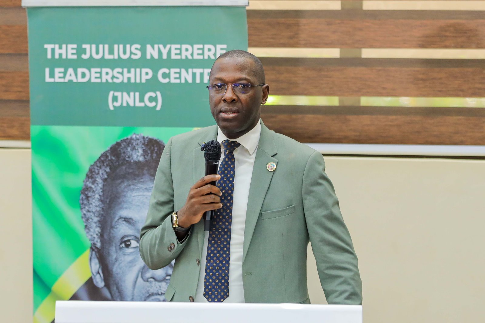 Mr. Andrew Tumusiime, JNLC Board Member. Julius Nyerere Leadership Centre (JNLC) at Makerere University, in partnership with the United Nations Development Programme (UNDP), two-day Community Innovation Showcase and Alumni Workshop 18th November 2025, School of Public Health Auditorium, Kampala Uganda, East Africa. An event dedicated to strengthening alumni-led community transformation across Uganda.
