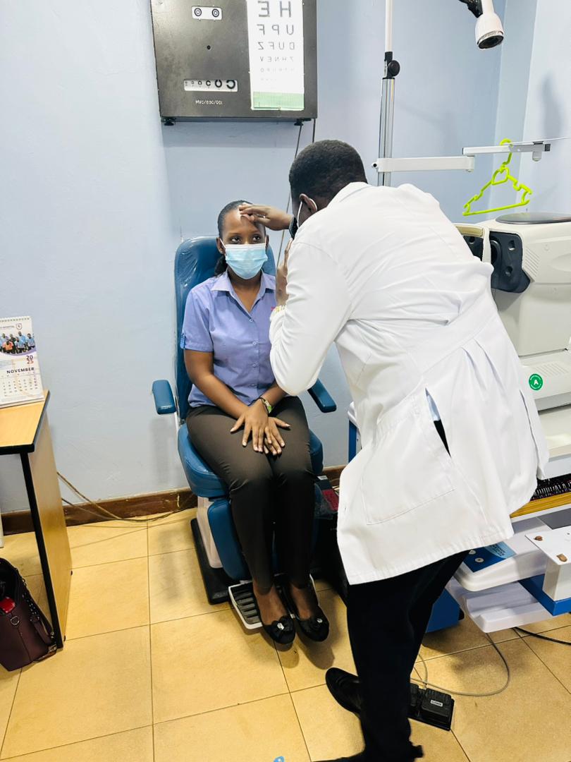 Dr. Ekwaro examining one of his patients at Mengo Hospital. Impact Stories: Dr Ekwaro Ronald, Mastercard Foundation Scholars Program alumnus, Optometrist, committed to enhancing eye health in Uganda. He plans to establish the country's first Myopia Control Centre, dedicated to safeguarding the eye health of young people in Uganda and neighbouring nations, November 2025, Makerere University, Kampala Uganda, East Africa, November 2025, Kampala Uganda, East Africa.
