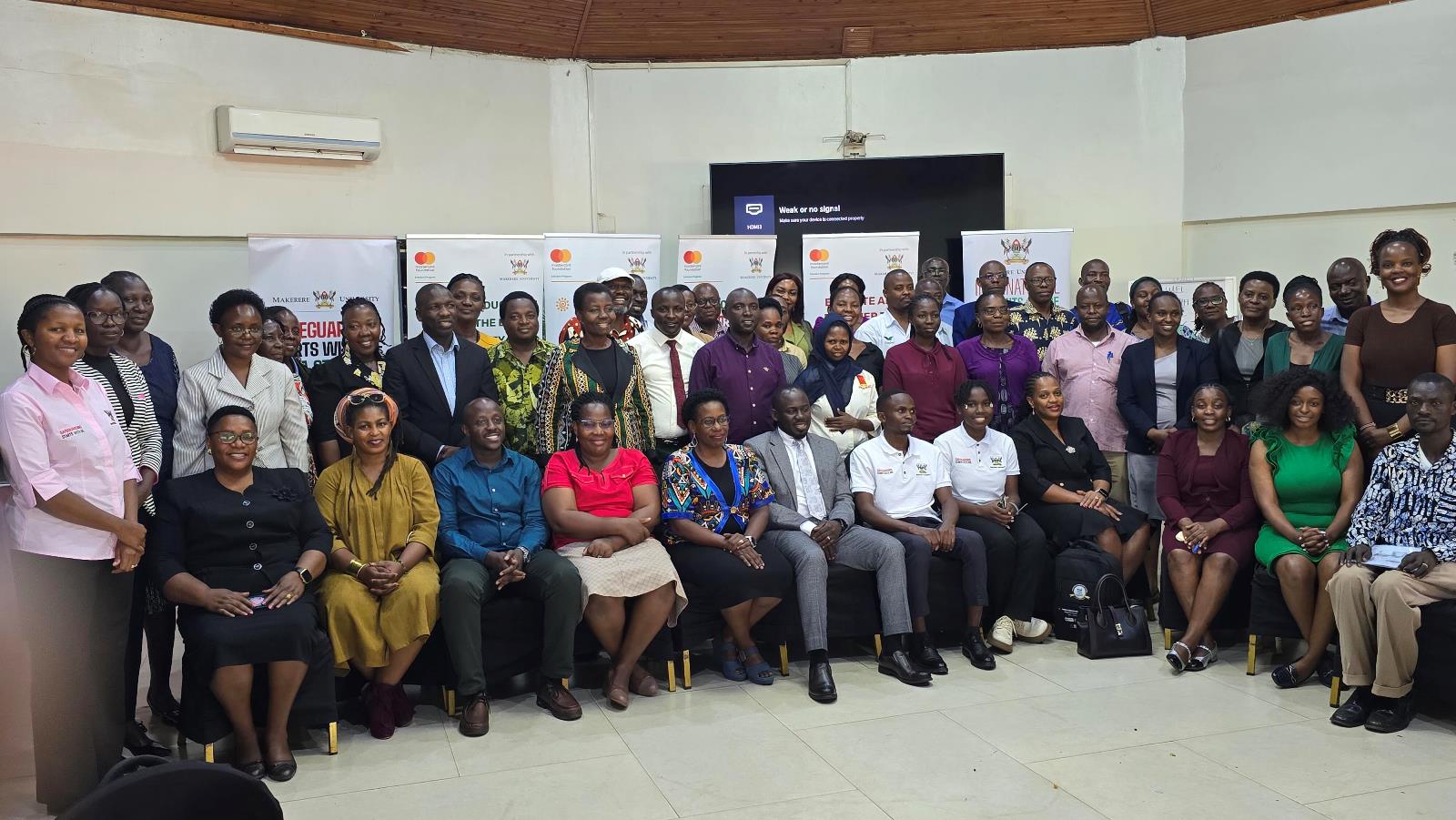 Mentors pose for a group photo at the end of their annual workshop at Fairway Hotel. Mastercard Foundation Scholars Program at Makerere University annual workshop for mentors, 13th November 2025, Fairway Hotel, Kampala Uganda, East Africa.