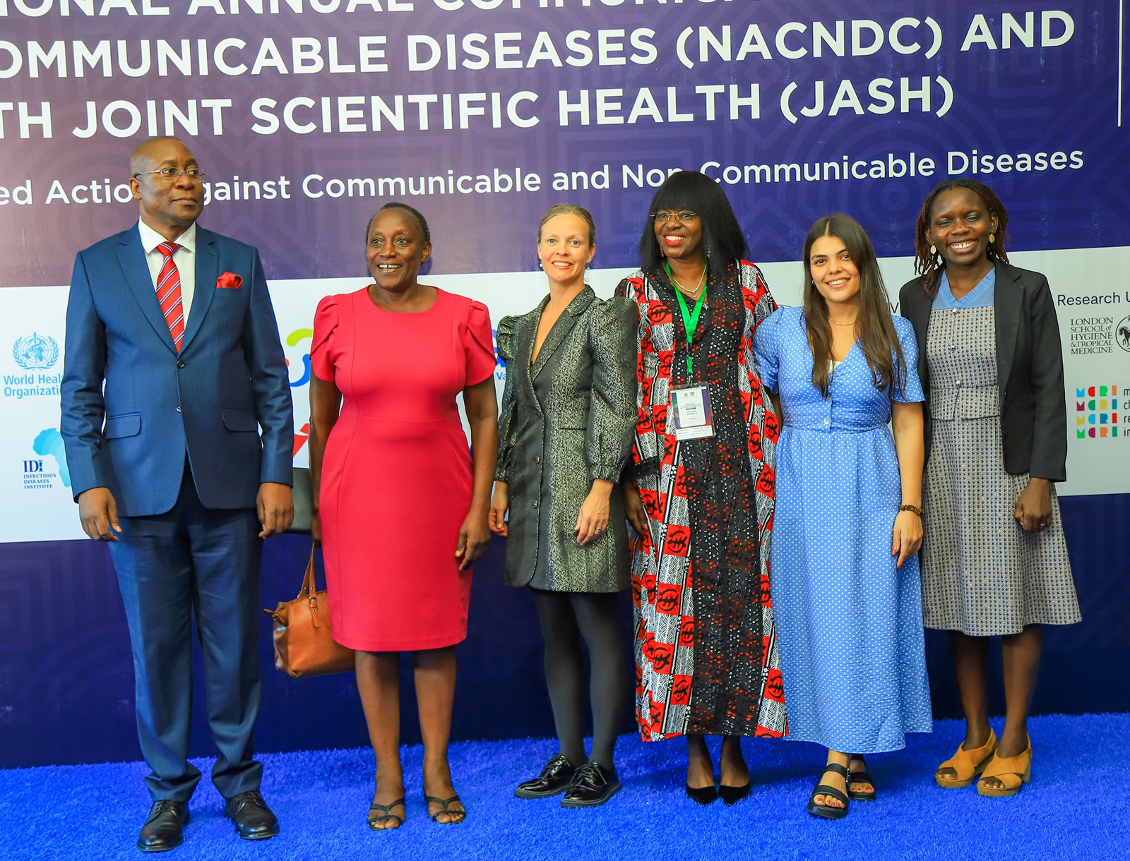 Justice Duncan Gaswaga (Left) with officials including Dr. Juliet Babirye (3rd Right) and panelists who included Dr. Ane-Marthe Solheim Skar (3rd Left), Dr. Harriet Aber-Odonga (Right) and others. Ministry of Health (MoH), Makerere University School of Public Health (MakSPH), Makerere University College of Health Science (MakCHS) and other partners jointly hosting the National Annual Communicable and Non-Communicable Diseases (NACNDC) and 19th Joint Annual Scientific Health (JASH) Conference 2025, running from 3rd to 7th November, Pre-Conference Symposium under the theme “Breaking the Silence: Advancing Mental Health Awareness and Resilience,” with a sub-theme on “Advancing Mental Health in Schools and Universities — Research and Policy Perspectives” 3rd November 2025, Victoria Hall, Speke Resort Munyonyo, Kampala Uganda, East Africa.