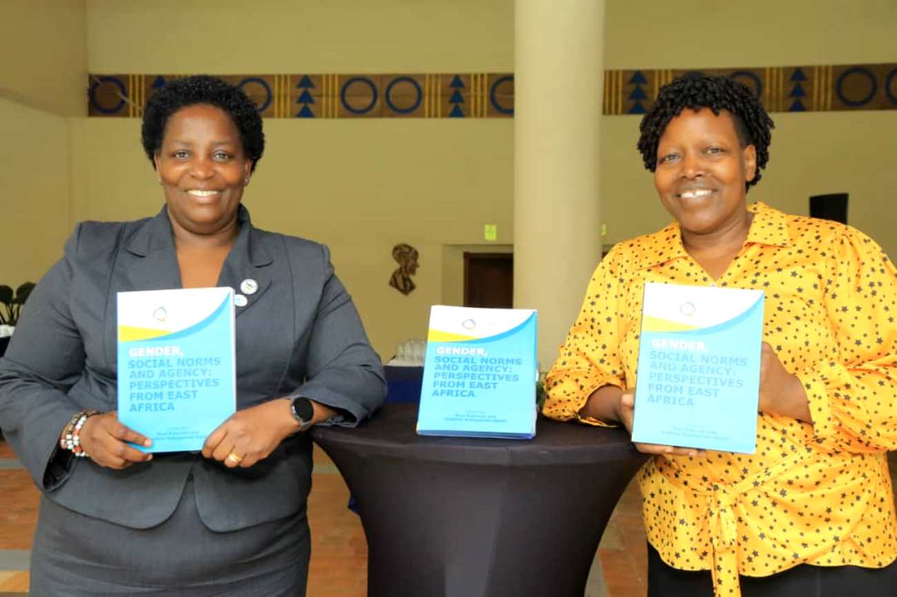 Prof. Helen Nambalirwa Nkabala (Left) and Prof. Ruth Nsibirano (Right) show off the book at the launch. Makerere University Press launch of highly anticipated book “Gender, Social Norms and Agency: Perspectives from East Africa”, Edited by Professor Paul Bukuluki and Dr. Daphine Agaba Kabagambe. November 2025, Golf Course Hotel, Kampala Uganda, East Africa.