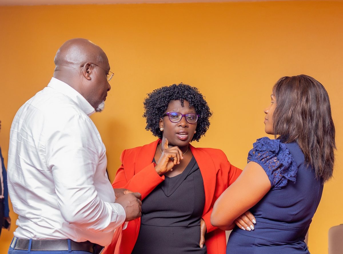L-R: The project team, Timothy Musila, a Health Policy, Planning and Financing Specialist, Pamela Achii, Procurement and Supply Chain Management Specialist at the Ministry, and Dr. Suzanne Kiwanuka share notes shortly after the consultative meeting at Kabira Country Club, Kampala. Makerere University School of Public Health (MakSPH), Ministry of Health (MoH) and Joint Medical Stores (JMS) launched of project to boost Uganda’s health supply chain backed by the Gates Foundation to improve emergency deliveries and use data to ensure lasting resilience, flag off-6th November 2025, stakeholder consultative workshop-10th November 2025, Kampala Uganda, East Africa.
