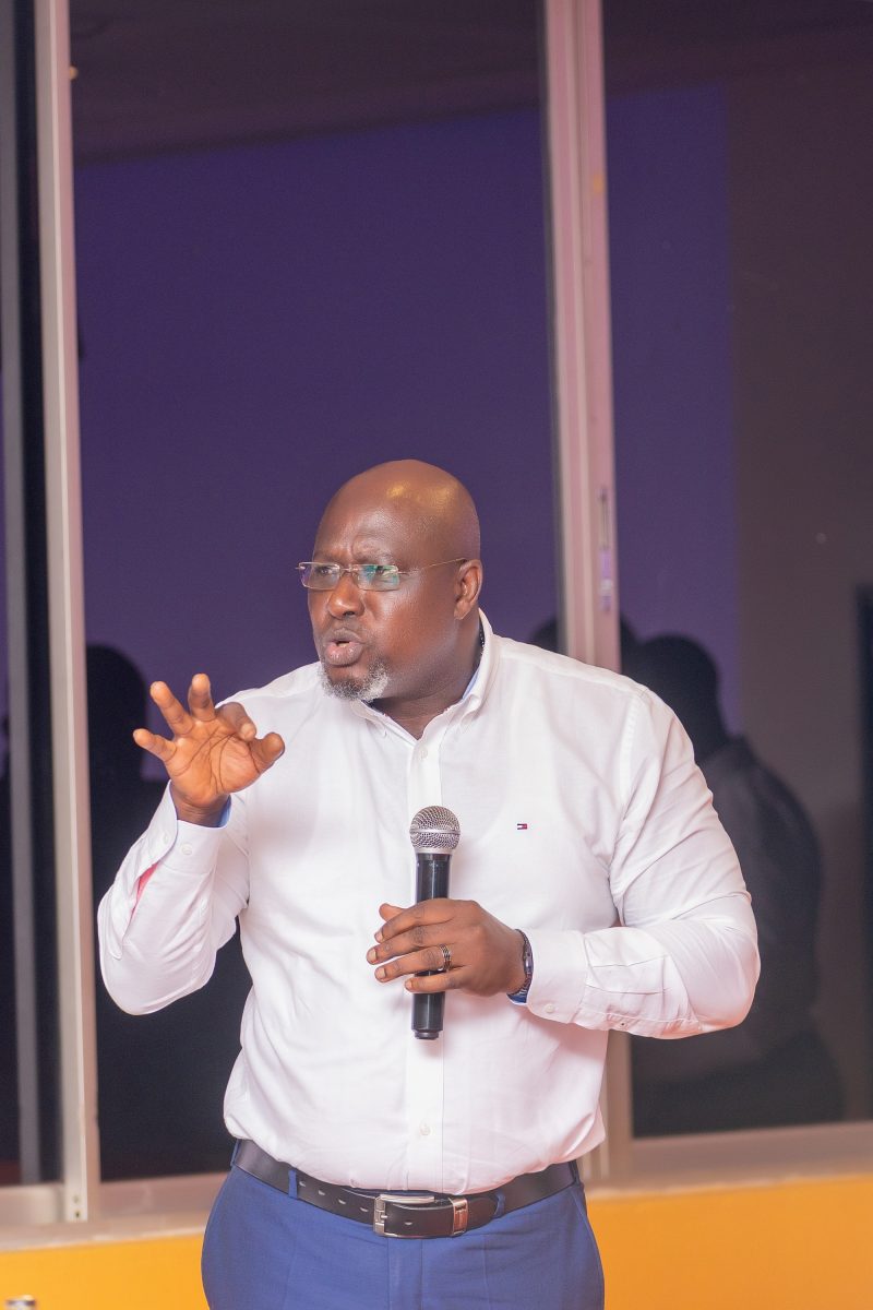 Timothy Musila, a Health Policy, Planning and Financing Specialist speaking at the consultative meeting. Makerere University School of Public Health (MakSPH), Ministry of Health (MoH) and Joint Medical Stores (JMS) launched of project to boost Uganda’s health supply chain backed by the Gates Foundation to improve emergency deliveries and use data to ensure lasting resilience, flag off-6th November 2025, stakeholder consultative workshop-10th November 2025, Kampala Uganda, East Africa.