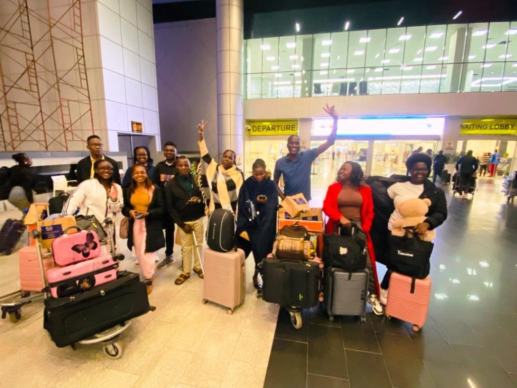 Students pose for a photo at Entebbe International Airport on their way to Istanbul, Turkey, to participate in the inaugural For Youth, By Youth Conference. Left to Right: Tete Mupenge (a student from Ashesi University), Anthony Byansi, Harriet Tyobo Yake, Naomi Ayebale, Kirabo Joel, Harunah Damba, Sandrah Naikambo, Helena Nuwagaba, Michael Emong (Sign Language Interpreter), Hope Nyamwiza (Sign Language Interpreter), and Rinah Marion Namwase. Six students from Makerere University, Kampala Uganda, East Africa travelled to Turkey to join 69 peers from other prestigious universities for the inaugural For Youth, By Youth Conference on Conscious Leadership and Global Solidarity organised by the Talloires Network of Engaged Universities, in collaboration with paNhari and Sabancı University, and supported by the Mastercard Foundation, 17th to 18th November 2025.