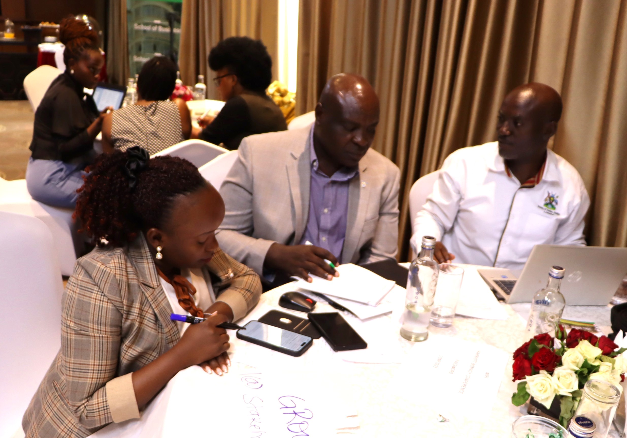 Participants from Group 1 in a discussion. The high-level annual workshop organised by the Environment for Development (EfD) Makerere University Centre through its regional Inclusive Green Economy (IGE) Programme to draw a roadmap for accelerating the adoption of Climate Smart Agriculture (CSA) as Uganda struggles with rising climate shocks, stagnating agricultural productivity and worsening poverty levels, held on December 4, 2025 at the Sheraton Kampala Hotel, Uganda, East Africa.