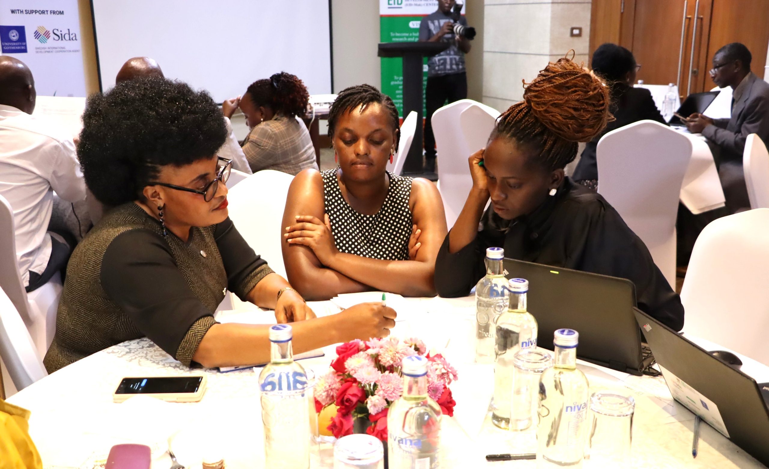 Participants from Group 2 discussing. The high-level annual workshop organised by the Environment for Development (EfD) Makerere University Centre through its regional Inclusive Green Economy (IGE) Programme to draw a roadmap for accelerating the adoption of Climate Smart Agriculture (CSA) as Uganda struggles with rising climate shocks, stagnating agricultural productivity and worsening poverty levels, held on December 4, 2025 at the Sheraton Kampala Hotel, Uganda, East Africa.