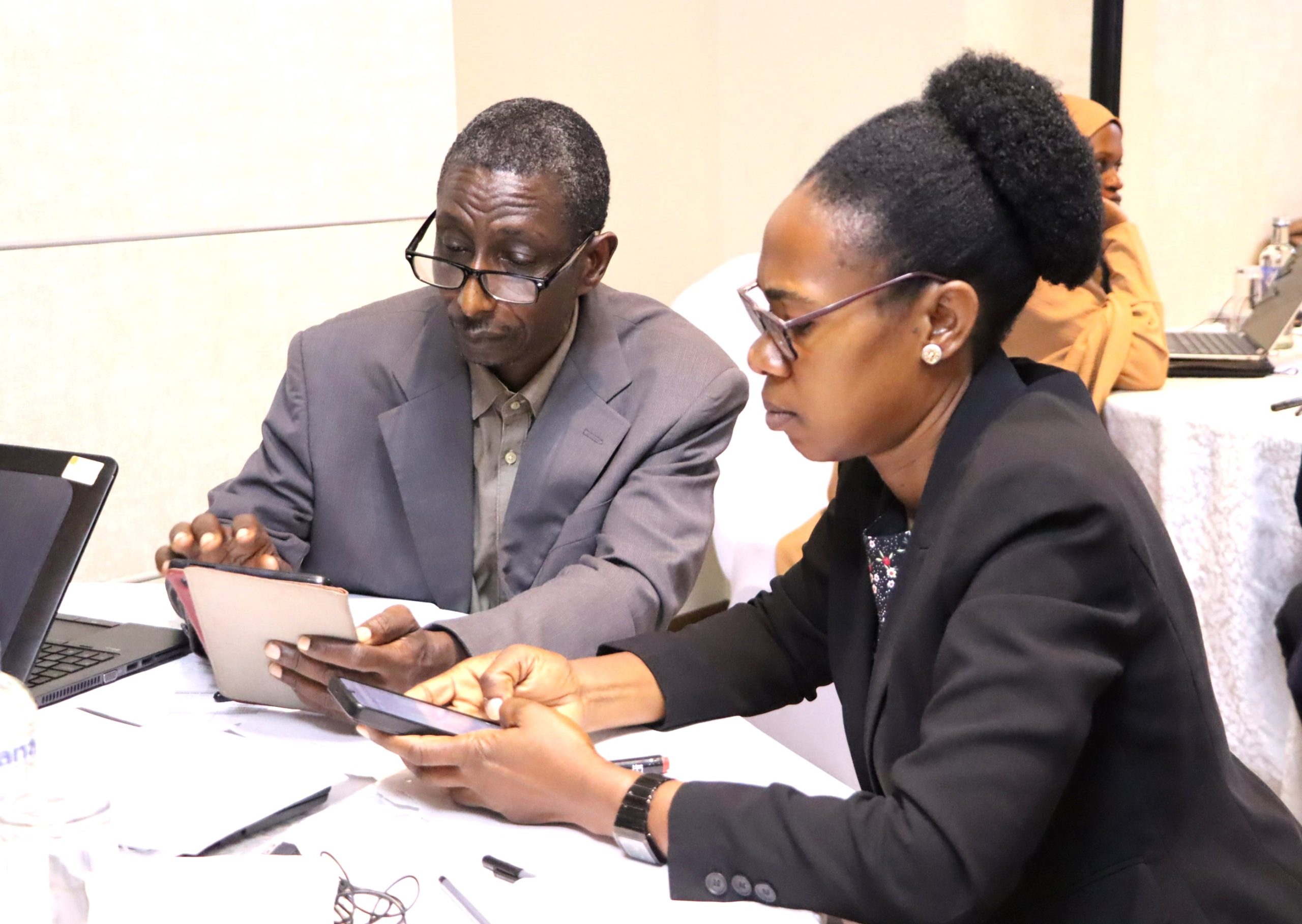 Participants from Group 4 discussing. The high-level annual workshop organised by the Environment for Development (EfD) Makerere University Centre through its regional Inclusive Green Economy (IGE) Programme to draw a roadmap for accelerating the adoption of Climate Smart Agriculture (CSA) as Uganda struggles with rising climate shocks, stagnating agricultural productivity and worsening poverty levels, held on December 4, 2025 at the Sheraton Kampala Hotel, Uganda, East Africa.