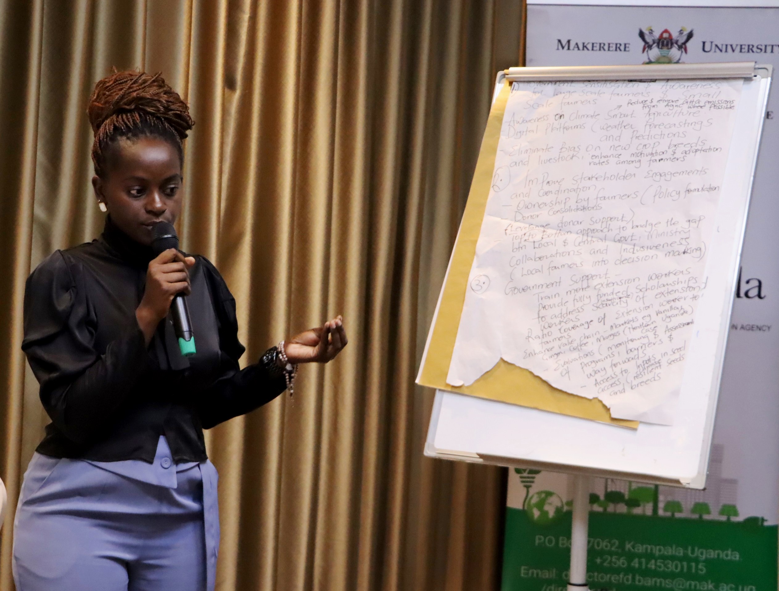 Ruth - an intern EfD-Mak centre presenting results from the group discussion. The high-level annual workshop organised by the Environment for Development (EfD) Makerere University Centre through its regional Inclusive Green Economy (IGE) Programme to draw a roadmap for accelerating the adoption of Climate Smart Agriculture (CSA) as Uganda struggles with rising climate shocks, stagnating agricultural productivity and worsening poverty levels, held on December 4, 2025 at the Sheraton Kampala Hotel, Uganda, East Africa.