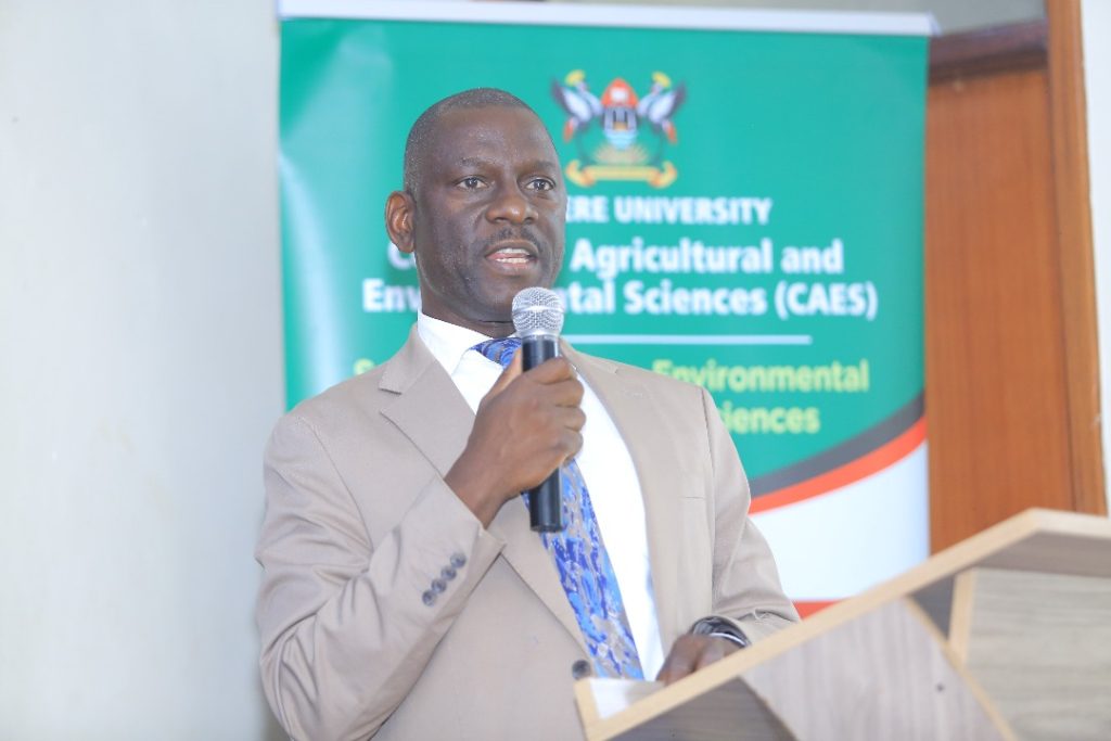 Prof. Julius Kikooma, Director of Graduate Training at Makerere University speaking to the students. He delivered a keynote on the theme – Making the PhD Relevant to Africa’s Development Aspirations. Inaugural College of Agricultural and Environmental Sciences (CAES) Doctoral Symposium, held from 10th to 11th September 2025, School of Food Technology, Nutrition, and Bioengineering Conference Hall, Makerere University, Kampala Uganda, East Africa.