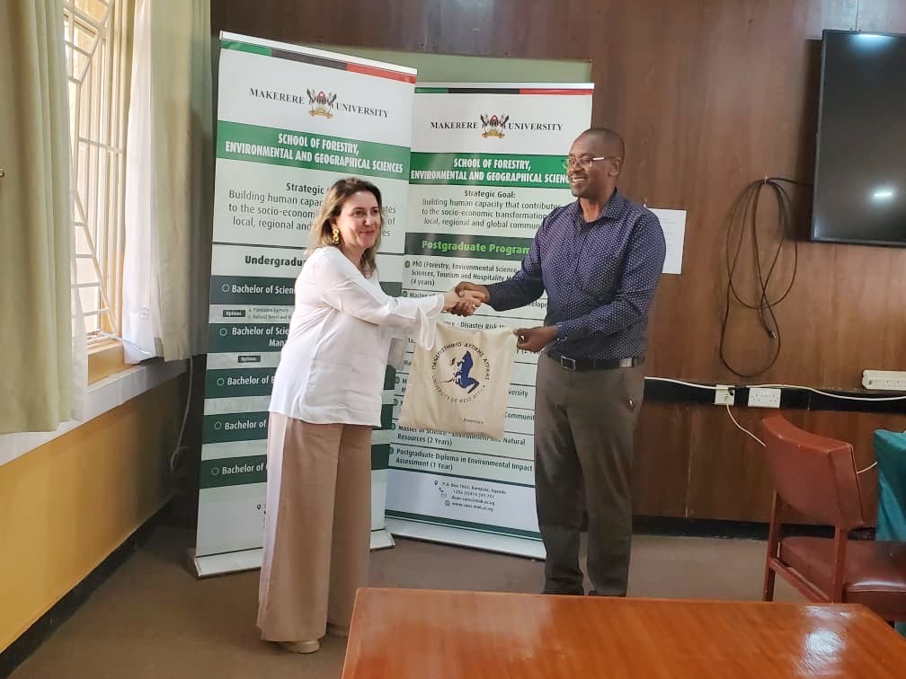Prof. Jim Ayorekire receives a souvenir from Prof. Sofia Asonitou. Department of Tourism, College of Agricultural and Environmental Sciences (CAES) hosts Prof. Sofia Asonitou from the University of West Attica, Greece, also Regional Coordinator for the Sub-Saharan Africa region under the Erasmus+ International Credit Mobility (ICM) framework at her institution. 11 December 2025, Makerere University, Kampala Uganda.